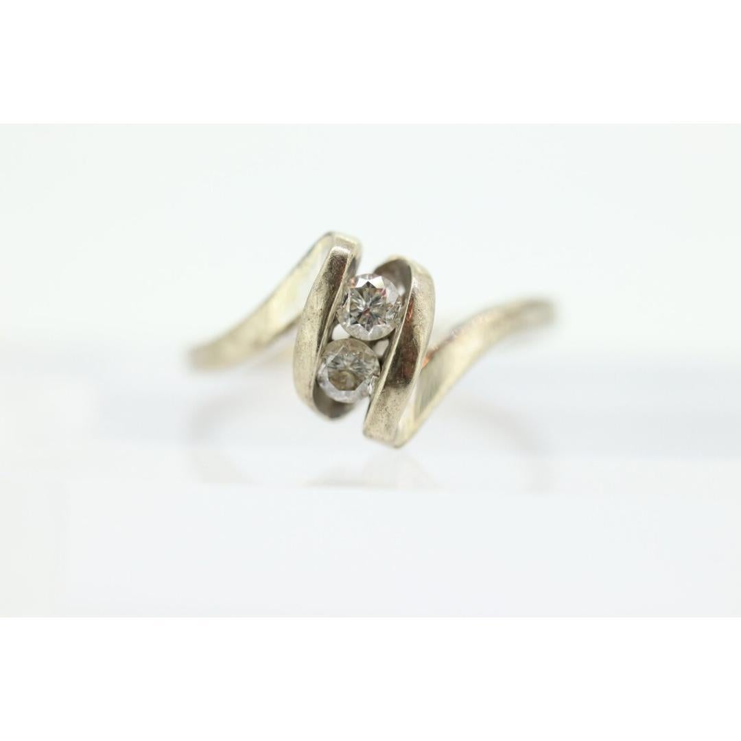 Diamond Tension Ring. 10k White Gold Diamond Bypass Double diamond Swirl Swivel For Sale 4