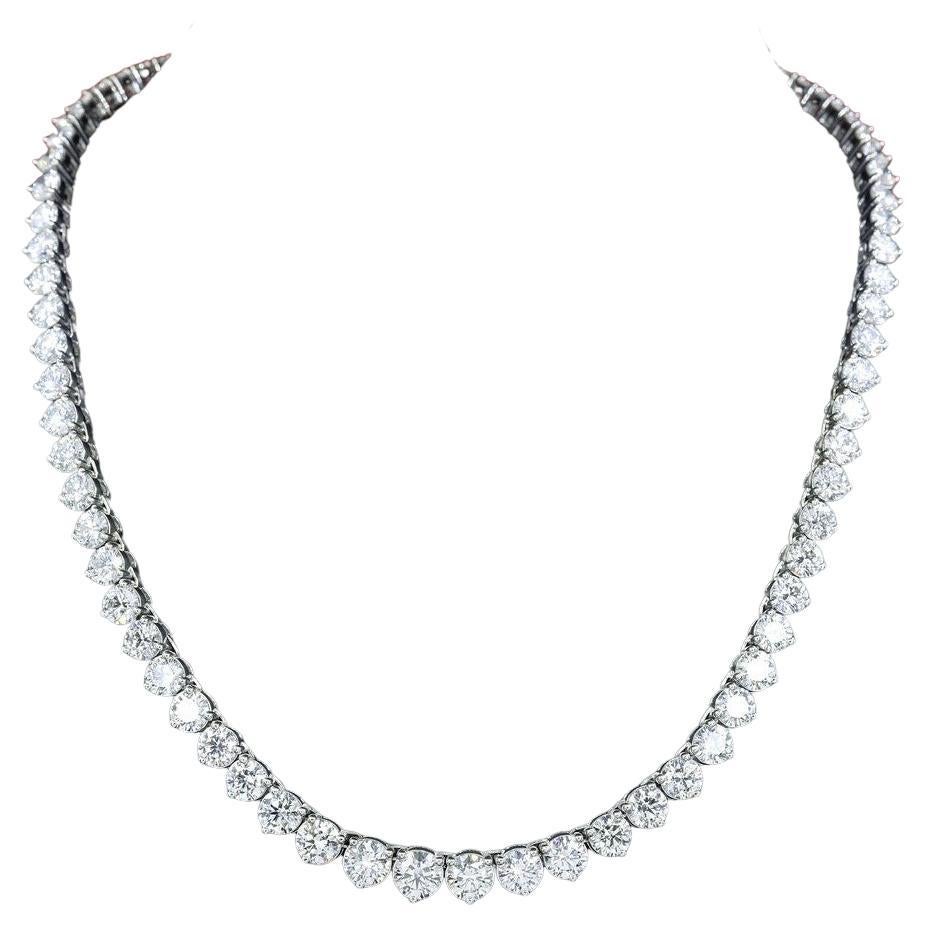 This stunning and impressive Riviera Necklace features substantial Diamond weight of 18 Carats in beautifully graduated Round Brilliant Cut gems with a sparkly excellent cut white color G clarity VS/SI1. Each stone has a three claw setting with open
