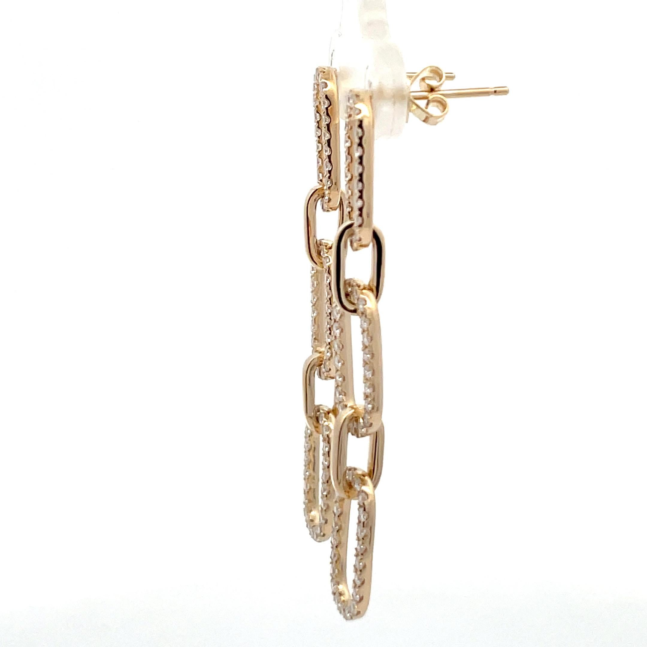 14 Karat yellow gold drop earrings featuring 132 round brilliance weighing 0.99 carats in a paper clip motif. Color G
Clarity SI
