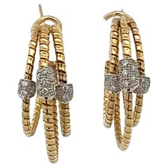 Pendientes de oro amarillo de 18 quilates de tres filas de diamantes con aro de palanca