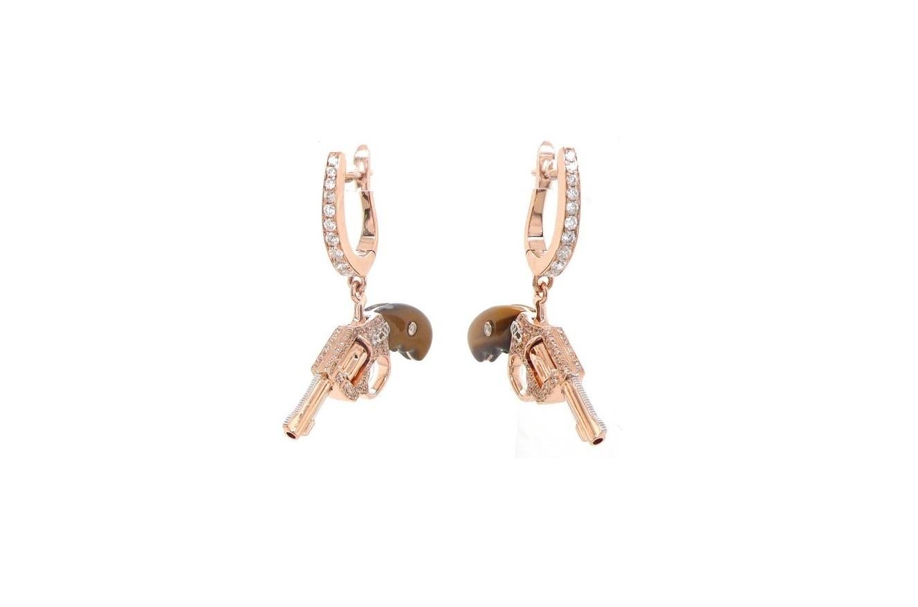 Diamond Tigers Eye Gemstone Gun Revolver 18 Rose Gold Huggie Pave Drop Earrings
18K Rose Gold
Golden Brown Tigers Eye Revolver Gun Earrings
1.40 cts Pave Diamonds 

This is a combination of solid rose + white gold + golden brown TIger's Eye handle