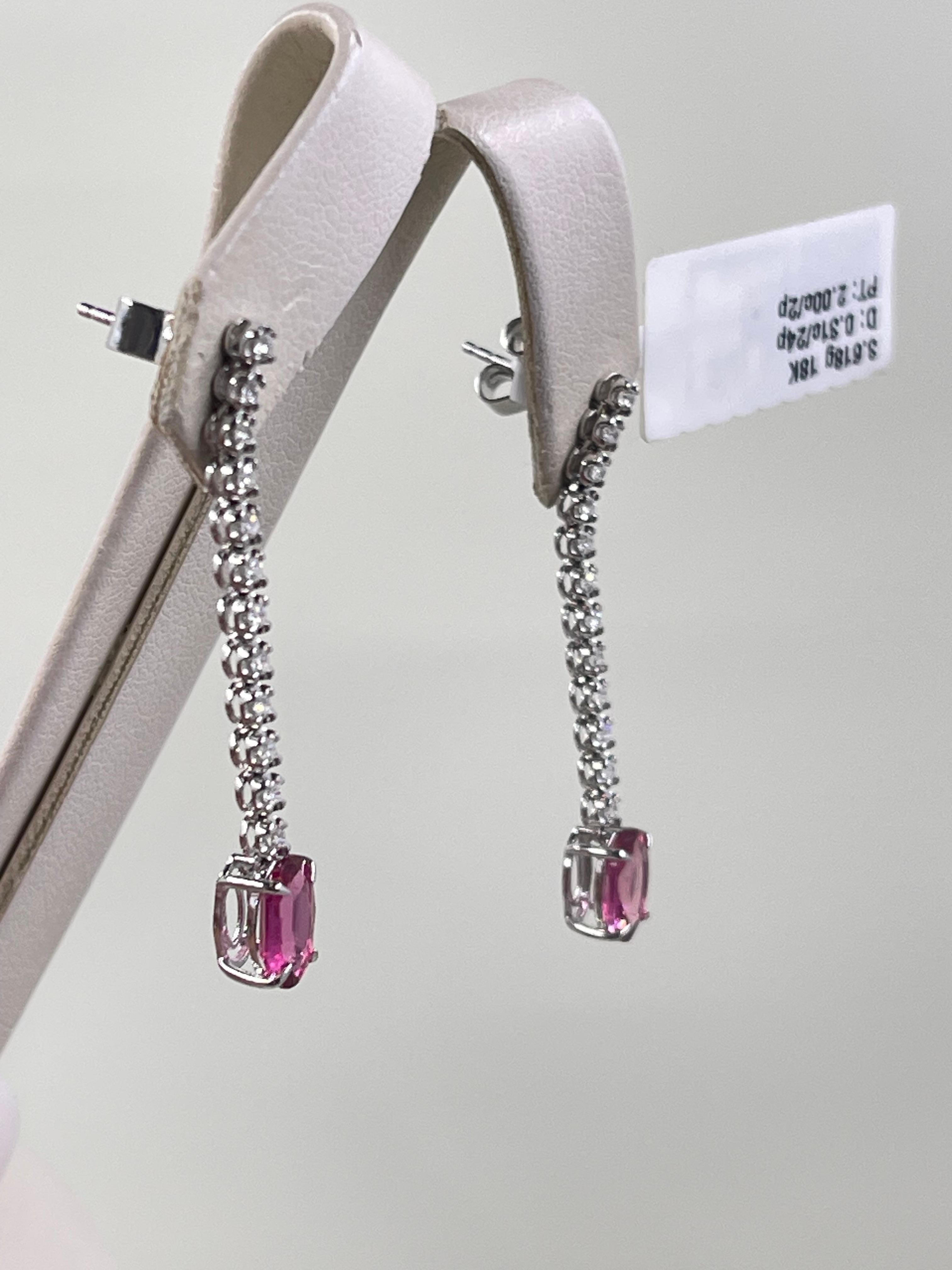 Stunning Diamond & Tourmaline Drop Earrings In 18k White Gold. 
- 0.31 total carats weight in diamonds,
- 2 total carats weight in pink tourmaline,
Hanging length is 1.5”
Elegant addition to your jewelry collection! 


