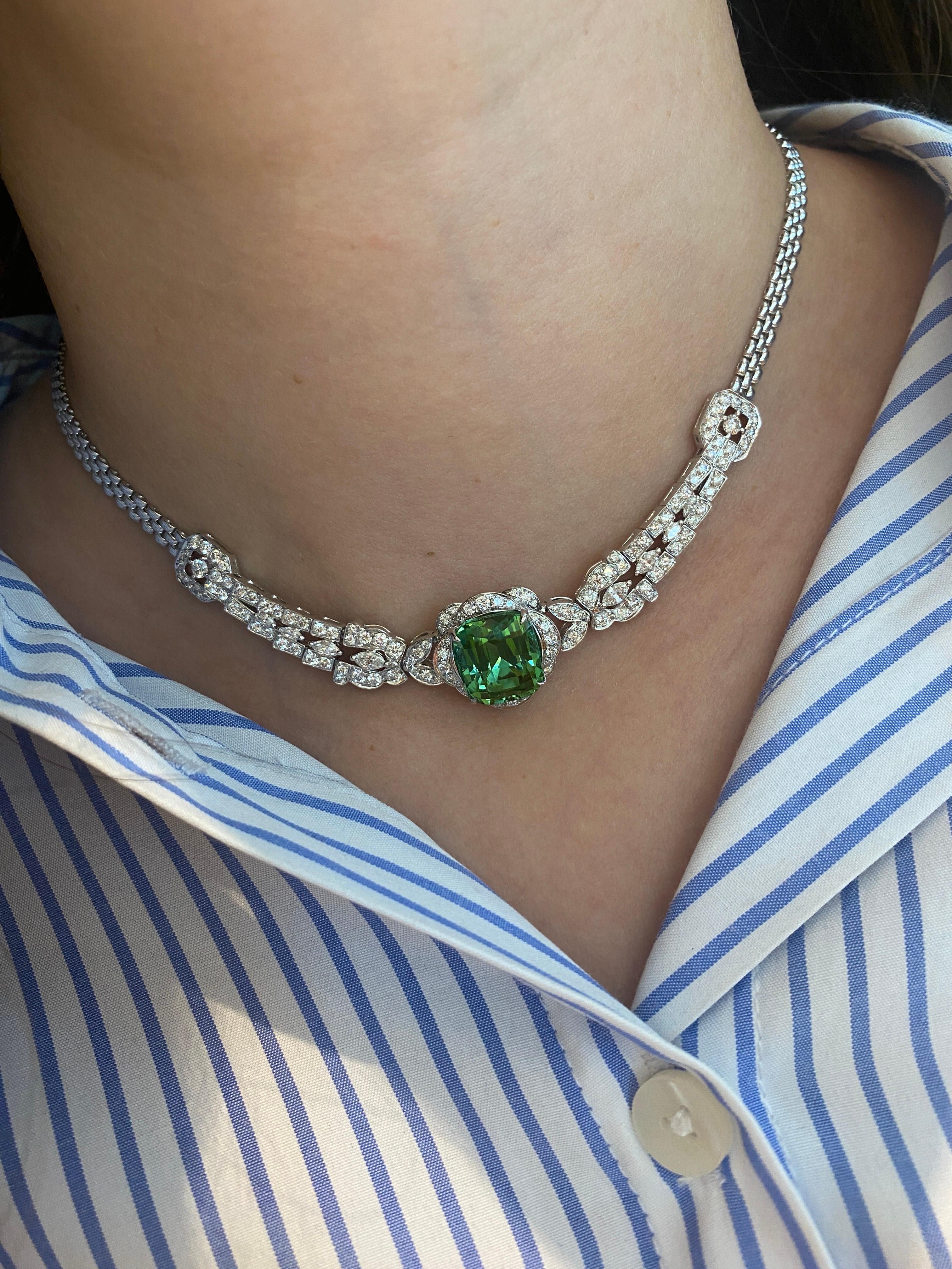 Introducing a stunning diamond necklace with a radiant tourmaline stone, exuding elegance and allure. A true masterpiece of refined luxury and timeless beauty.