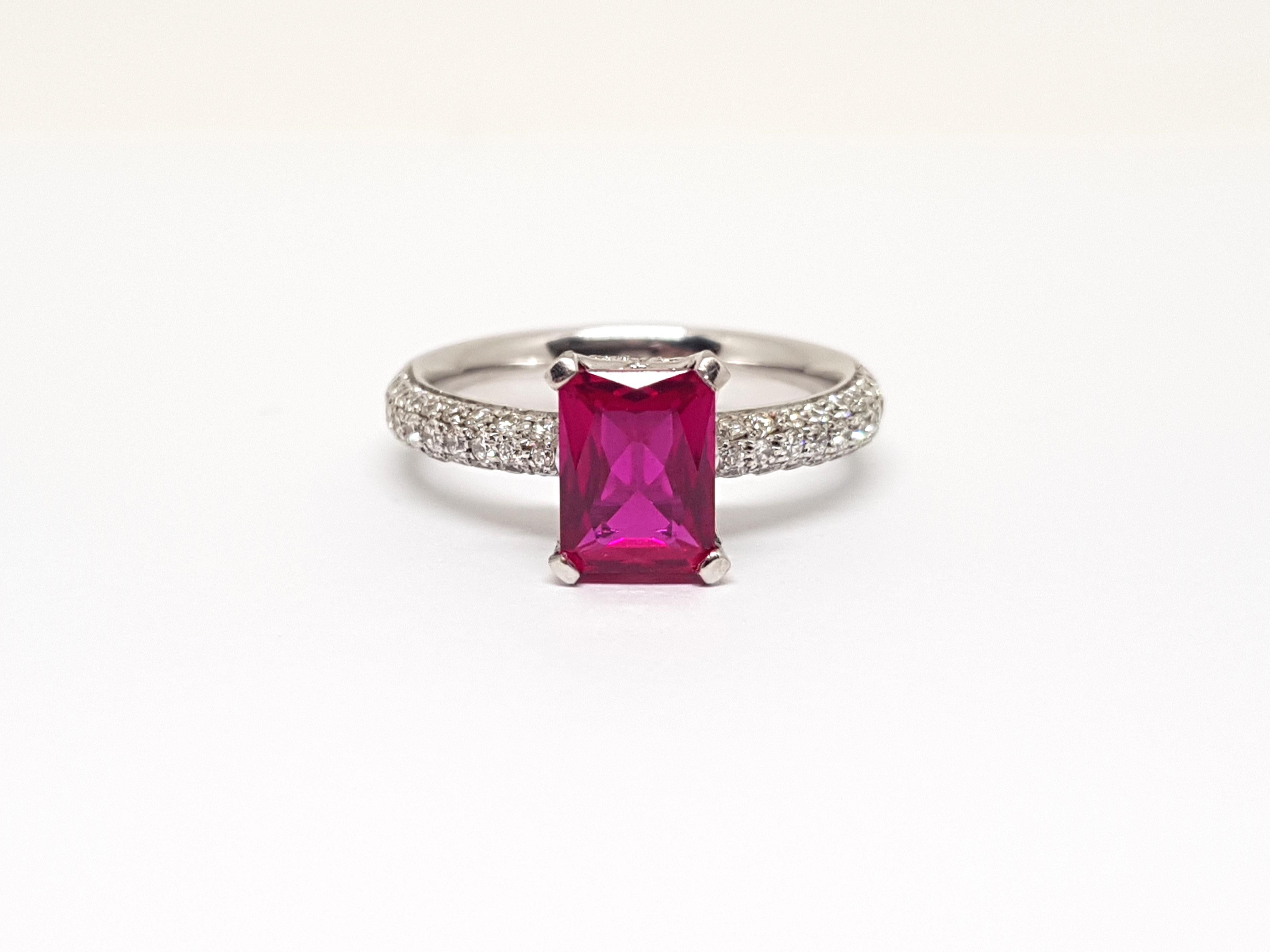 Gold: 18 Karat White Gold 
Weight: 6.00 grams.
Diamonds: 1.22 ct. Color: F clarity: VS1
Rubilite Tourmaline: 2.00 ct. 
Width: 0.31 inches.
Ring size: US 8.00
Free resizing of Ring up to size US 13
All our jewellery comes with a certificate and 5