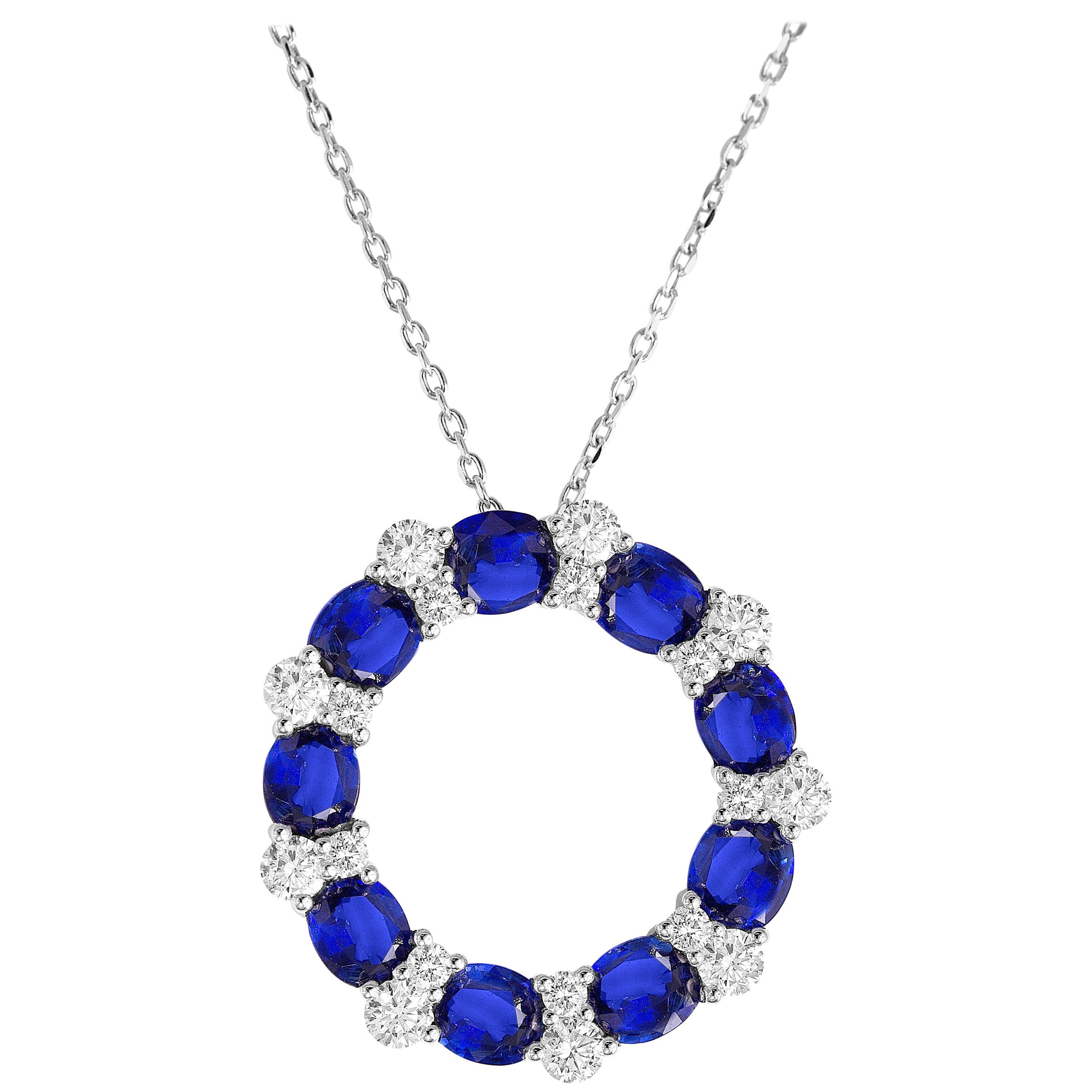 This exquisite pendant is a true masterpiece of elegance and sophistication.

Nine oval cut, dazzling blue sapphires total 3.18 carats. They gracefully alternate with 9 pairs of round cut, natural diamonds, a total of 0.96 carats of pure brilliance.