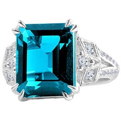 Diamond Town 8.29 Carat Emerald Cut Vivid Blue Topaz Ring in 14 Karat White Gold