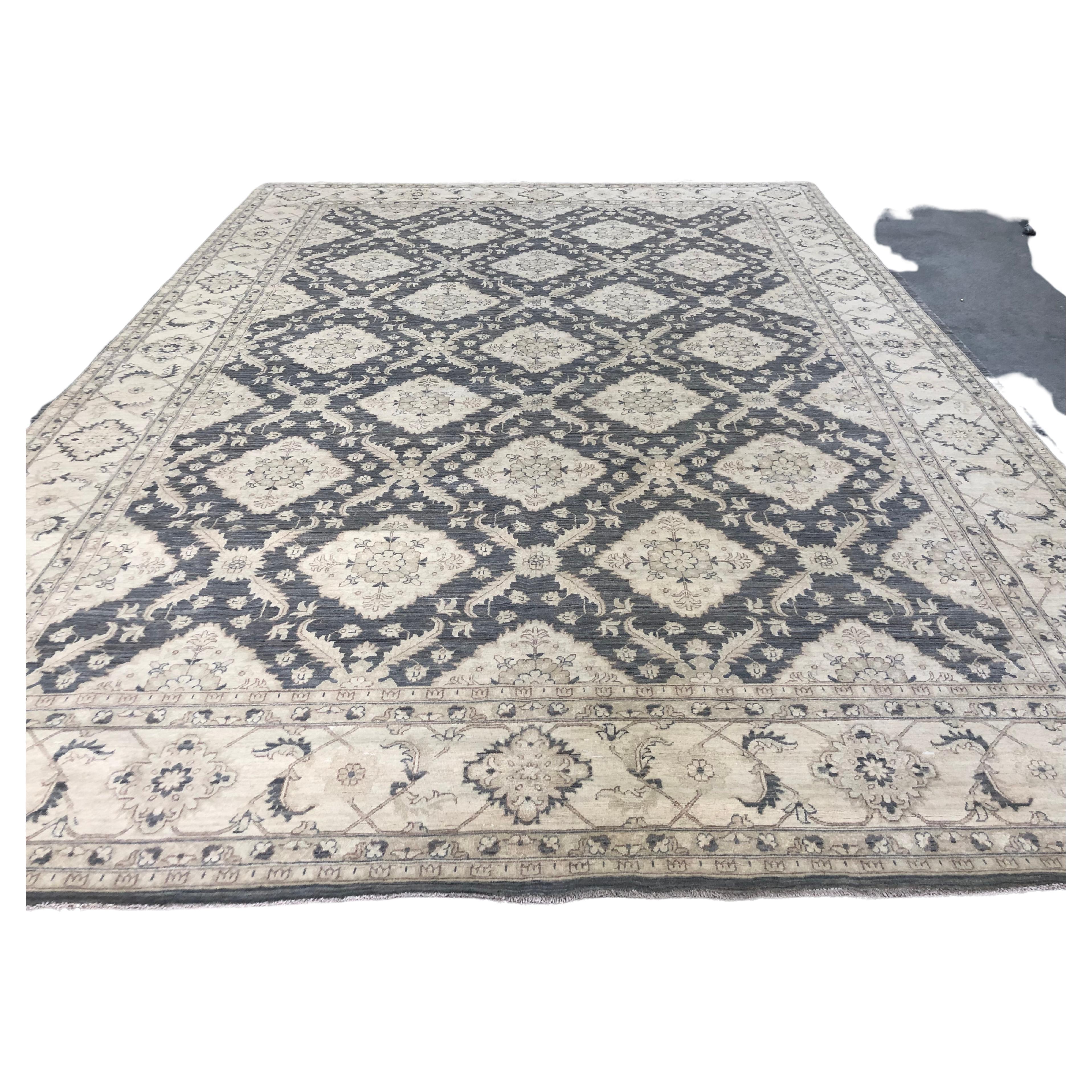 This Diamond and Trellis design is a contemporary take on a rug design that has been in use for centuries. Neat rows of diamond shaped designs framed by stunning intricately woven trellis patterns that is finished with an exquisitely complementary