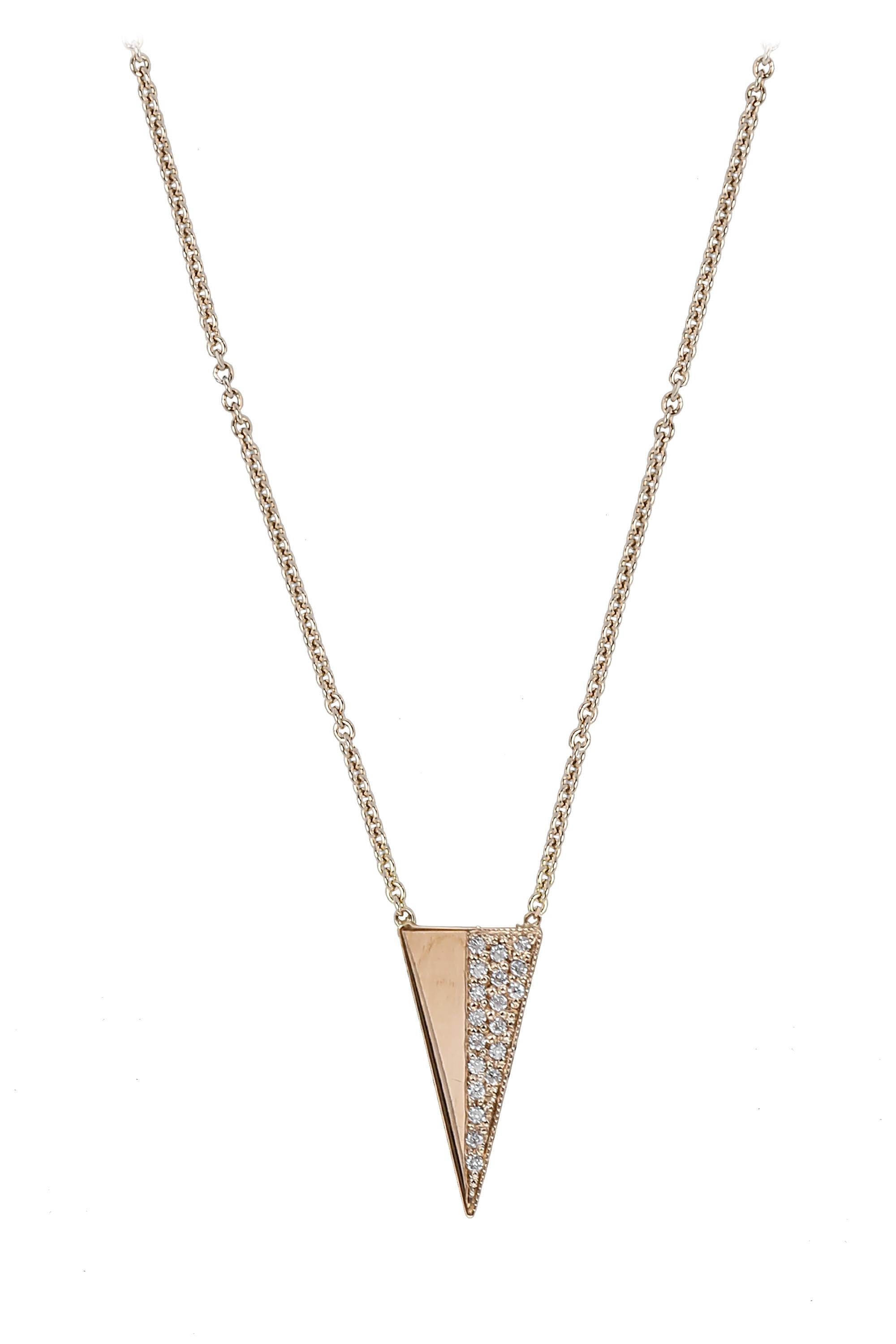 Nineteen round brilliant bead set diamonds weighing approximately .19 carats, light up one half of a polished triangle pendant suspended from a refined 18 “cable chain. A very stylish statement crafted in 14 karat yellow gold.