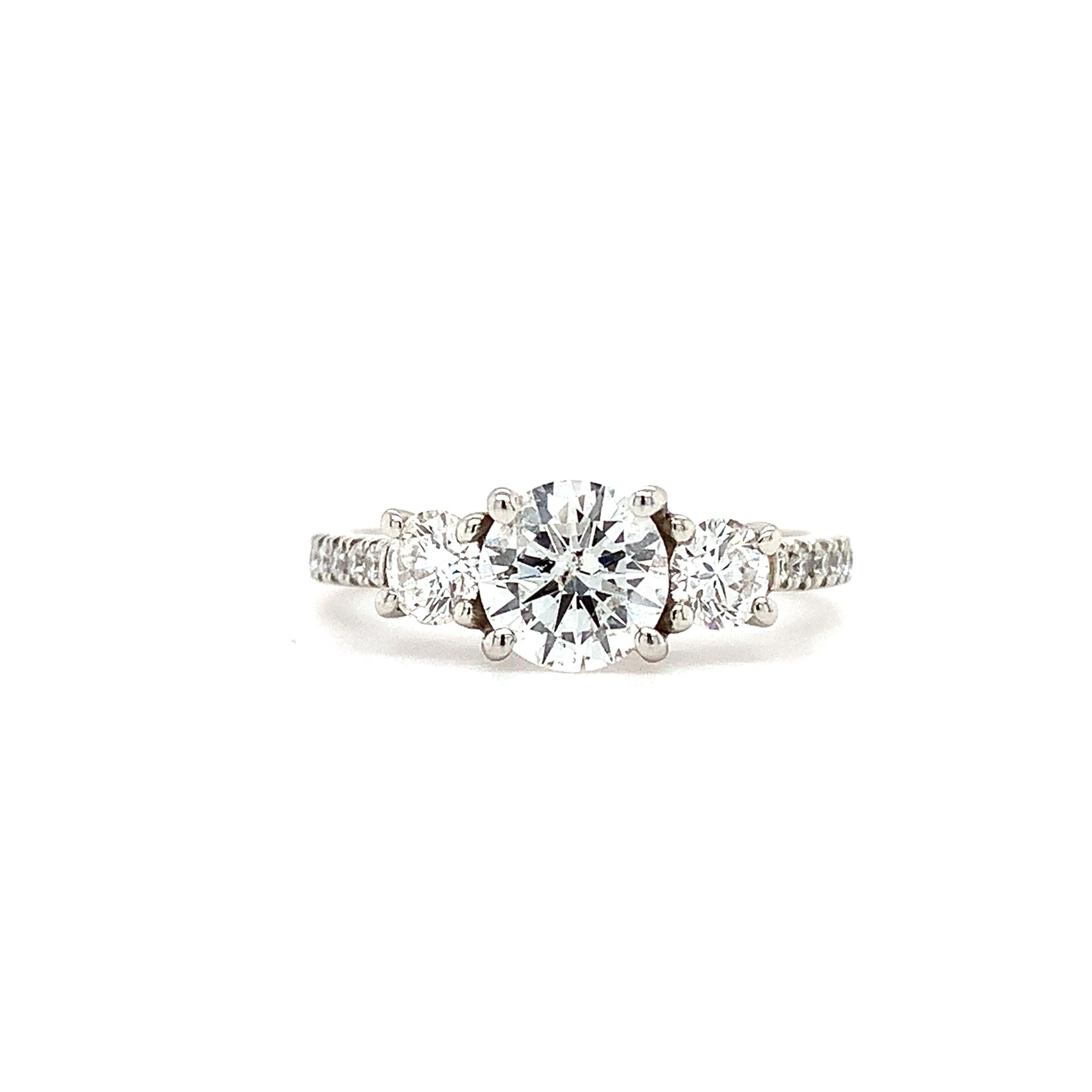Modern Diamond trilogy three stone engagement ring platinum For Sale