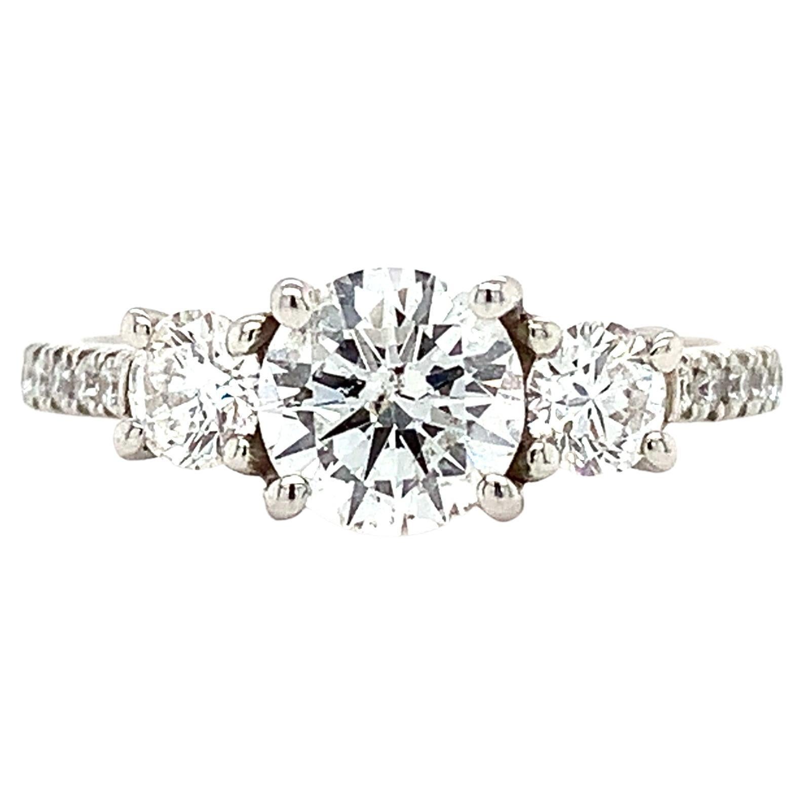 Diamond trilogy three stone engagement ring platinum