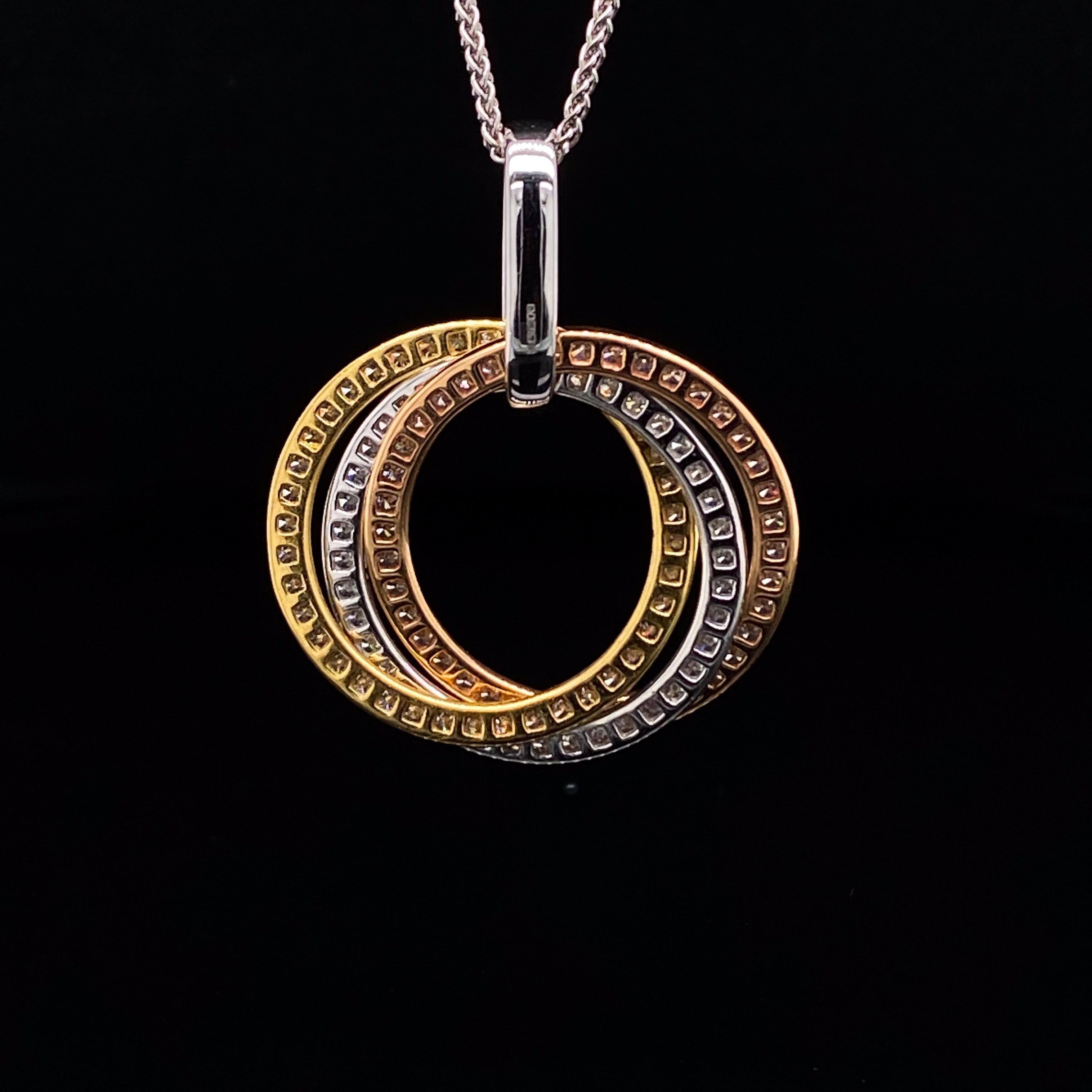A diamond trinity pendant necklace 18 karat white gold.

Composed of three white gold loops interlocked into one classic pendant. The loops are each pave set with round brilliant cut diamonds making the pendant stand out and sparkle beautifully on