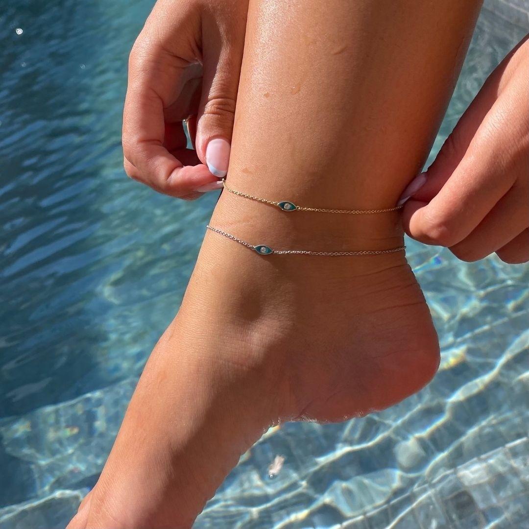 Diamond Turquoise Enamel Eye Anklet in 14K Yellow Gold - Shlomit Rogel

Dazzling and elegantly timeless, this dainty turquoise enamel evil eye ankle bracelet will steal your heart. Crafted from 14k solid yellow gold and embellished with a single