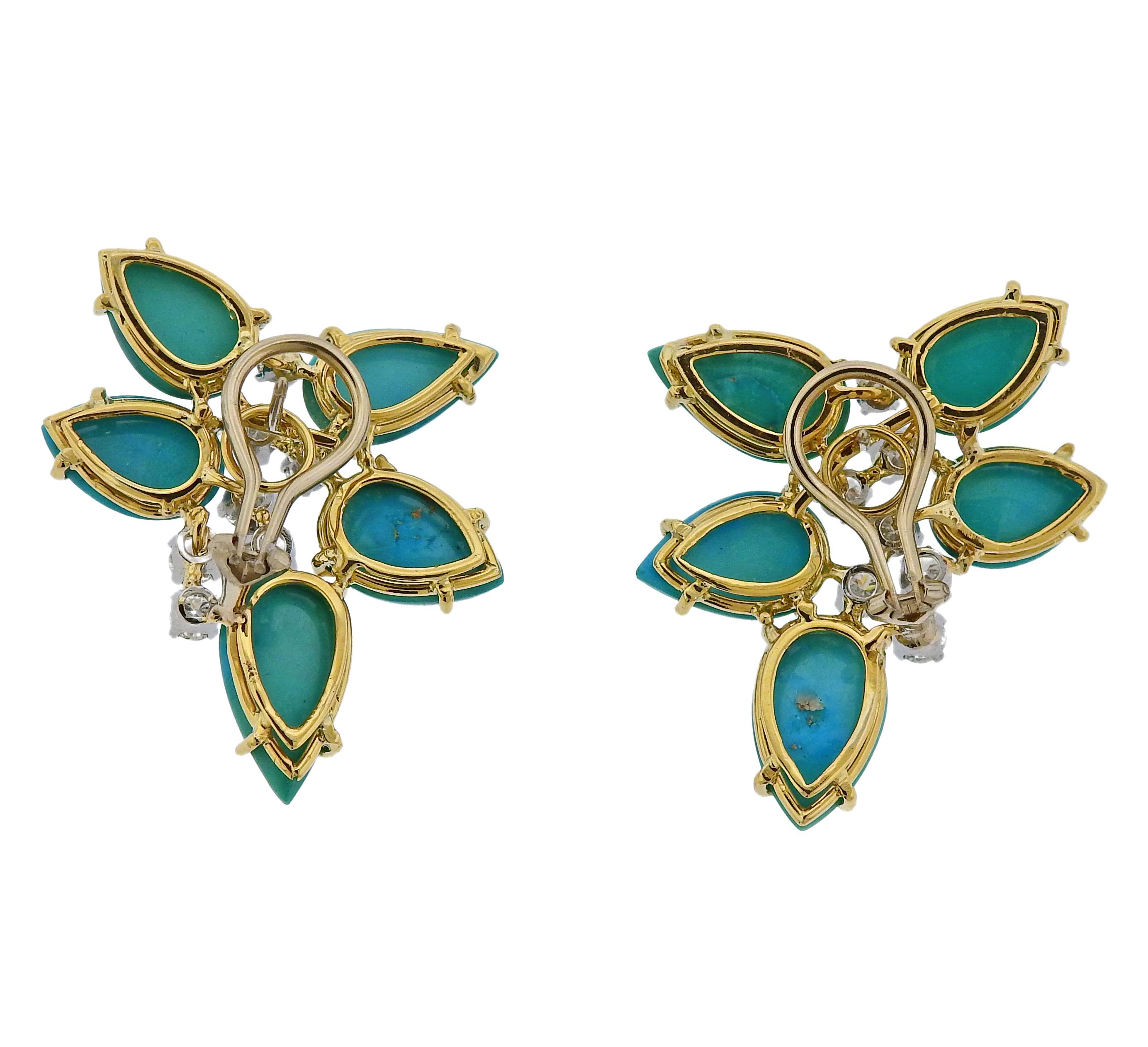 Pair of large cocktail earrings, set in 18k gold, adorned with turquoise and approx. 1.80ctw in GH/VS diamonds. Earrings are measured 40mm x 34mm.
Weight is 20.7 grams. Marked: 18K.