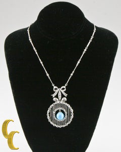 Diamond and Turquoise Necklace with Ribbon Bow Design Set in 18 Karat White Gold