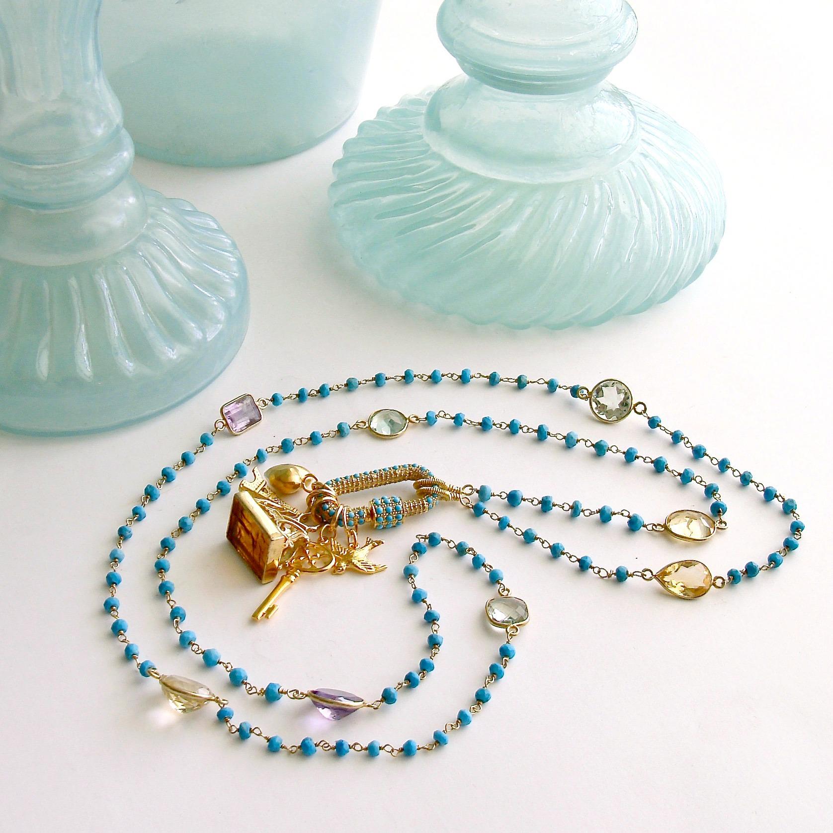 I am always a fan of jewelry designs that lend themselves to change - and this stunning turquoise necklace certainly checks all the boxes.  A long and sinewy hand-linked turquoise chain is interrupted with a medley of bezel set citrine, topaz,