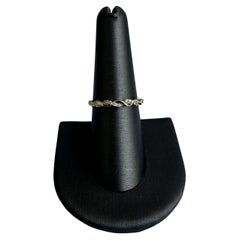 Diamond Twist Ring in 14kt Yellow Gold - 0.13ctw GH SI, Size 7, New Condition