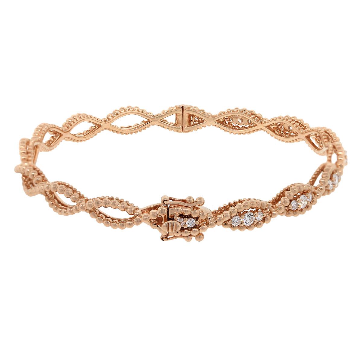 Material: 14k Rose Gold
Diamond Details: Approximately 0.95ctw of round brilliant diamonds. Diamonds are G/H in color and VS in clarity
Total Weight: 12.8g (8.2dwt)
Bracelet Measurements: will fit a 6.5