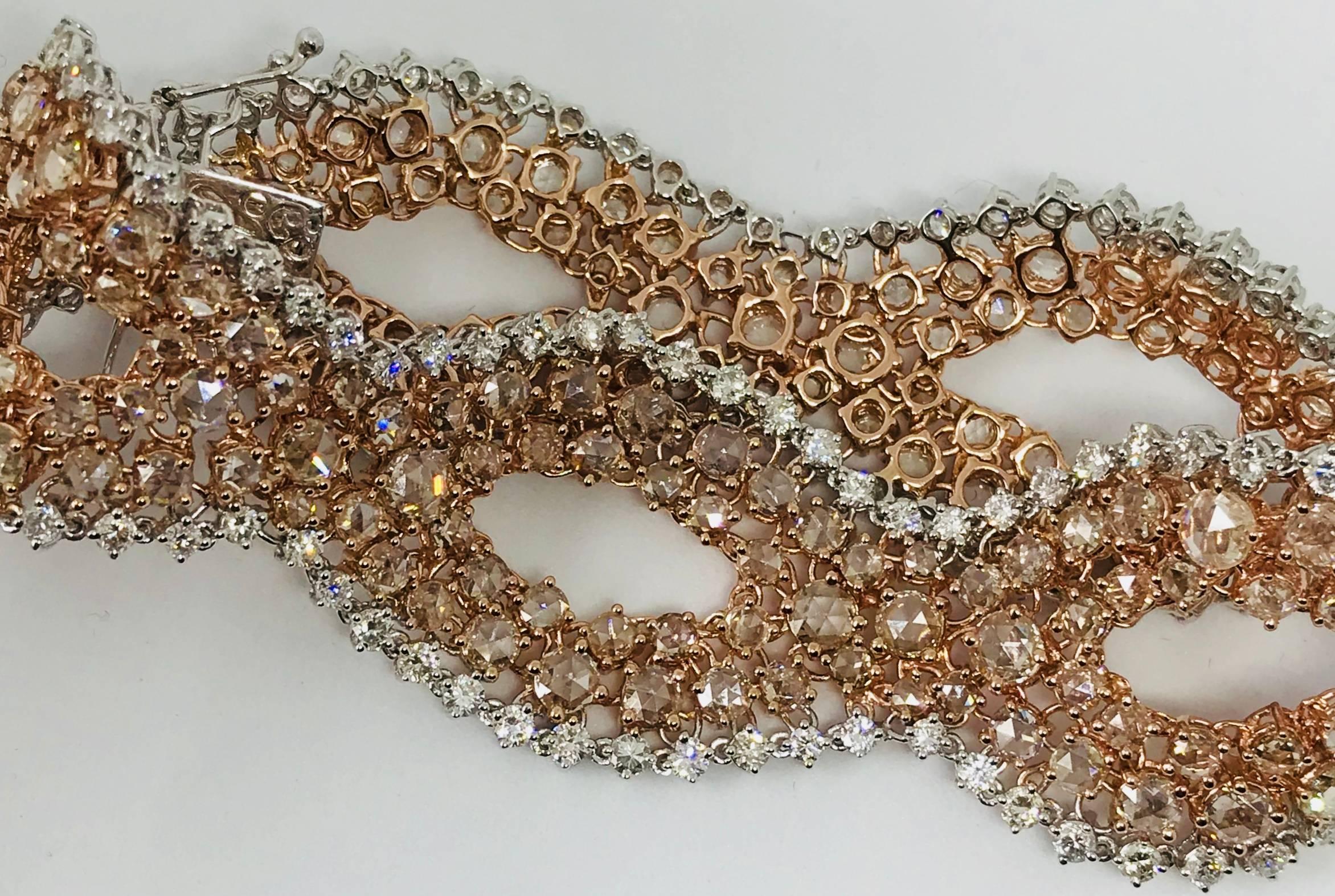 Modern Diamond Twisted Bracelet In 18k White and Rose Gold with White and Pink Diamonds For Sale