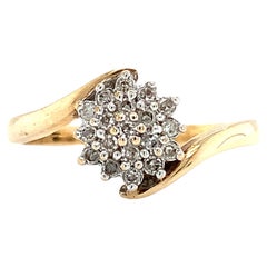 Diamond twisted chunky cluster engagement ring yellow gold