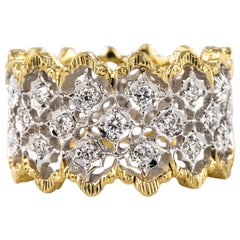 Anello con diamante in filigrana d'oro bicolore