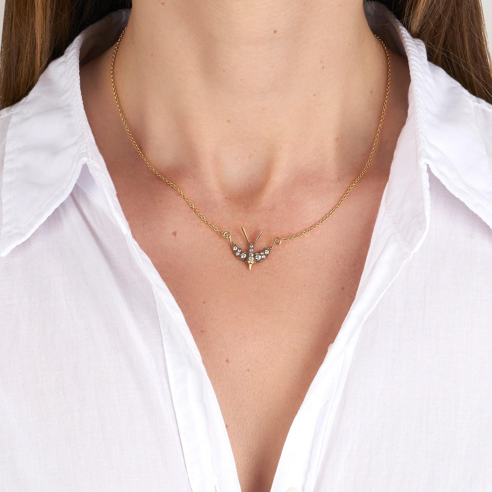 gold swallow necklace