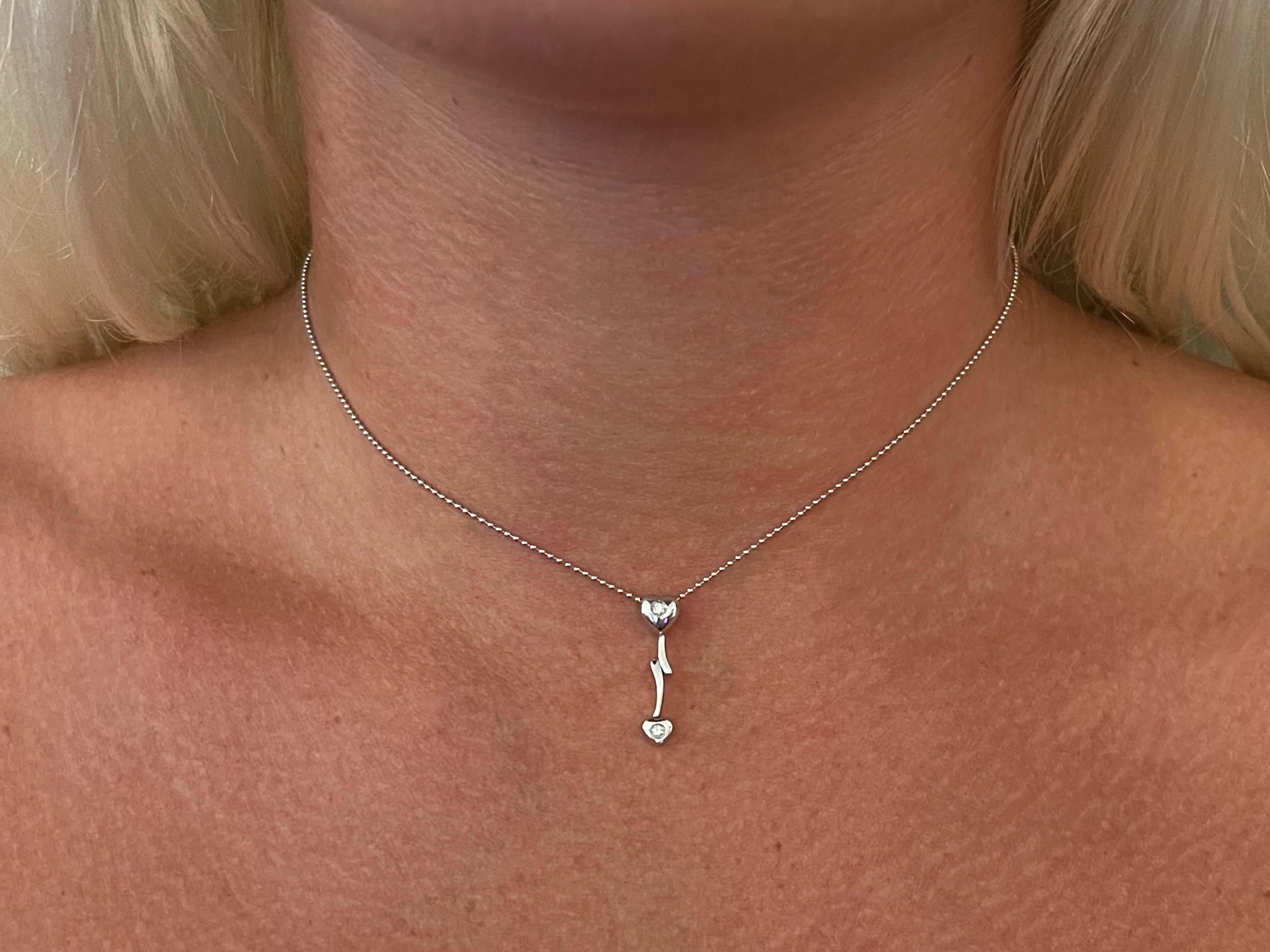 Item Specifications:

Necklace Metal: 14k White Gold

Total Weight: 2.7 Grams

Chain Length: 14