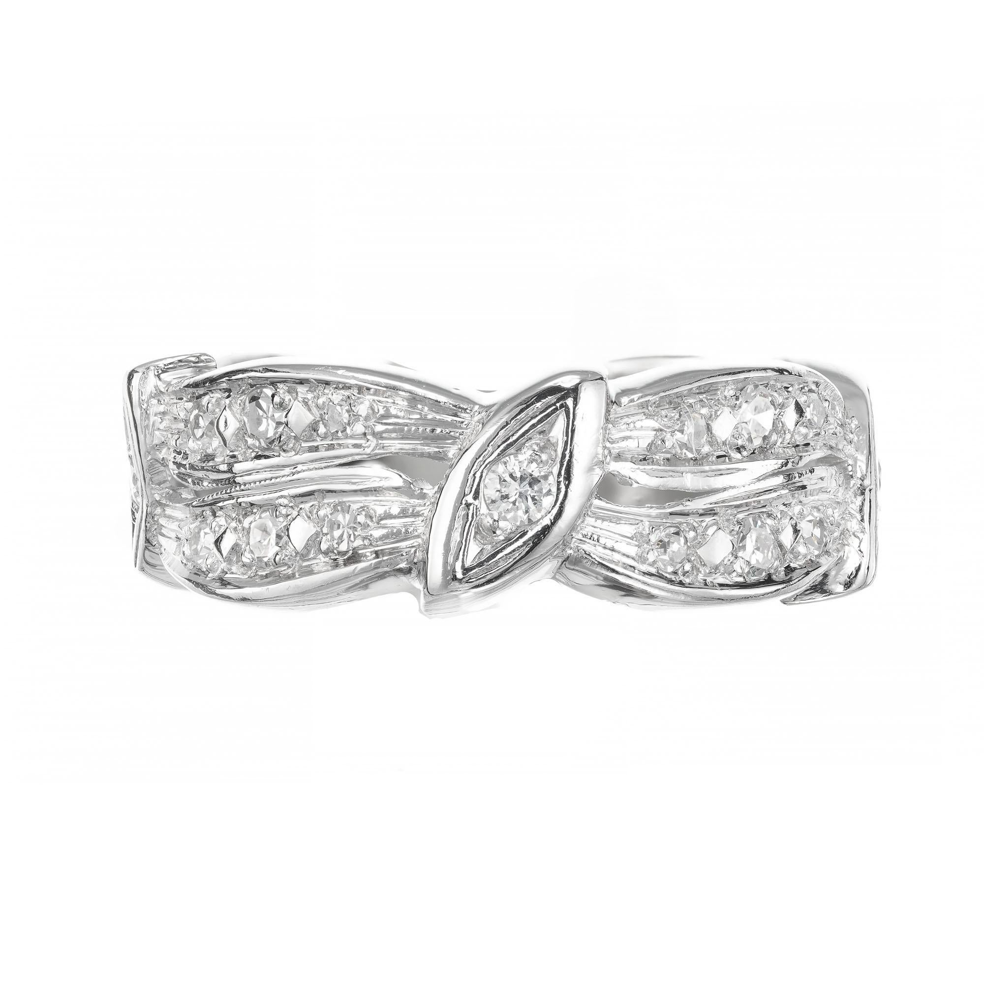 1960's handmade Diamond Two Row Swirl Platinum Eternity band. Double swirl design set with round diamonds. 

28 round diamonds approx. total weight .85cts, H, SI2.
Size 6 and sizable
Platinum
Tested: Platinum
7.3 grams
¼ x 7/8 inch

