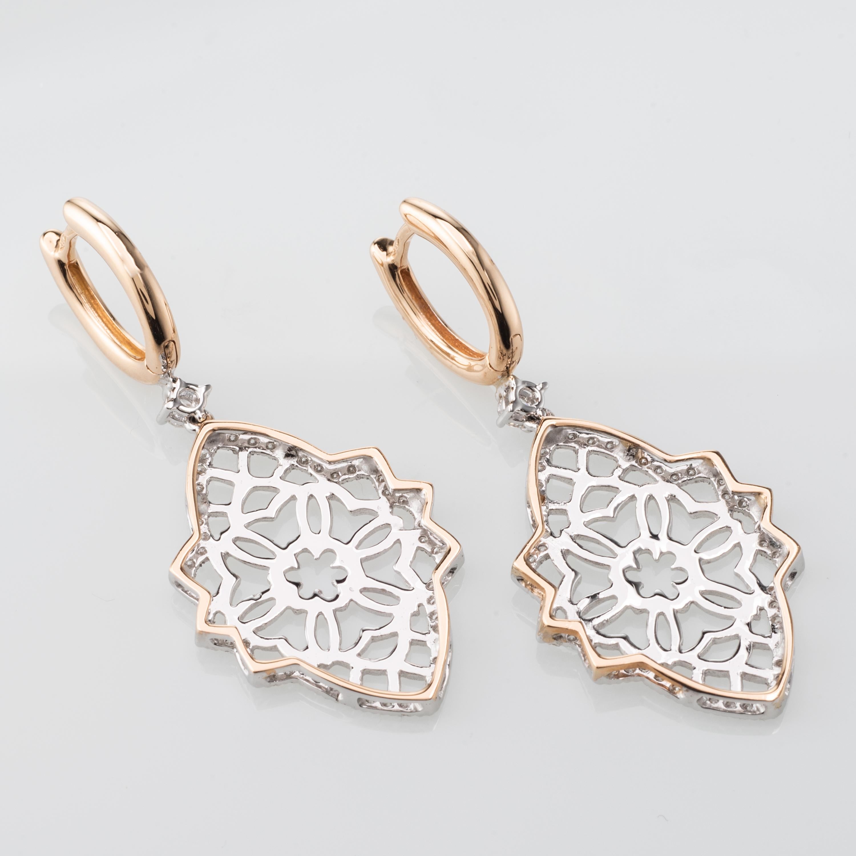 These masterfully crafted Earrings are enhanced by 0.44 Carat of Diamonds set in 18 Karat White and Rose Gold. Made in Italy.