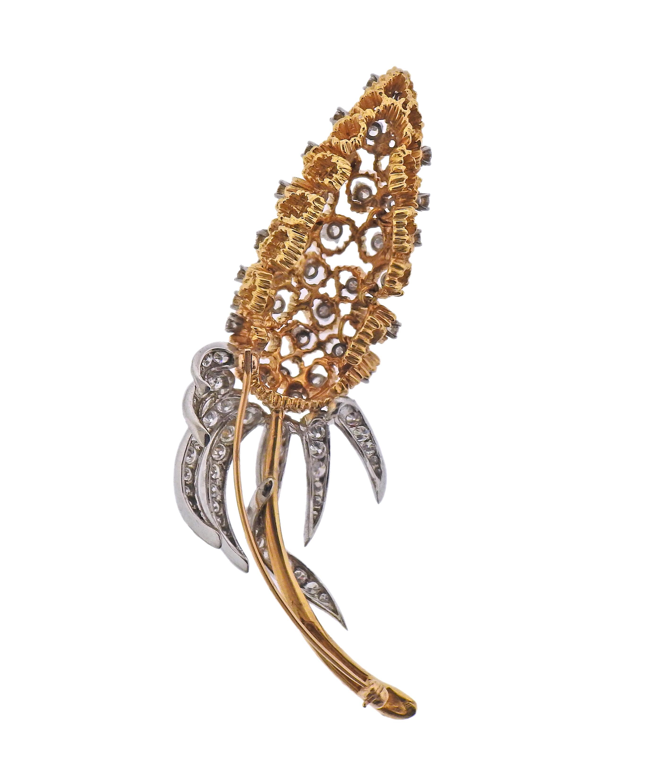 18k white and yellow gold brooch, decorated with approx. 2.80ctw in diamonds. Brooch measures 3.25