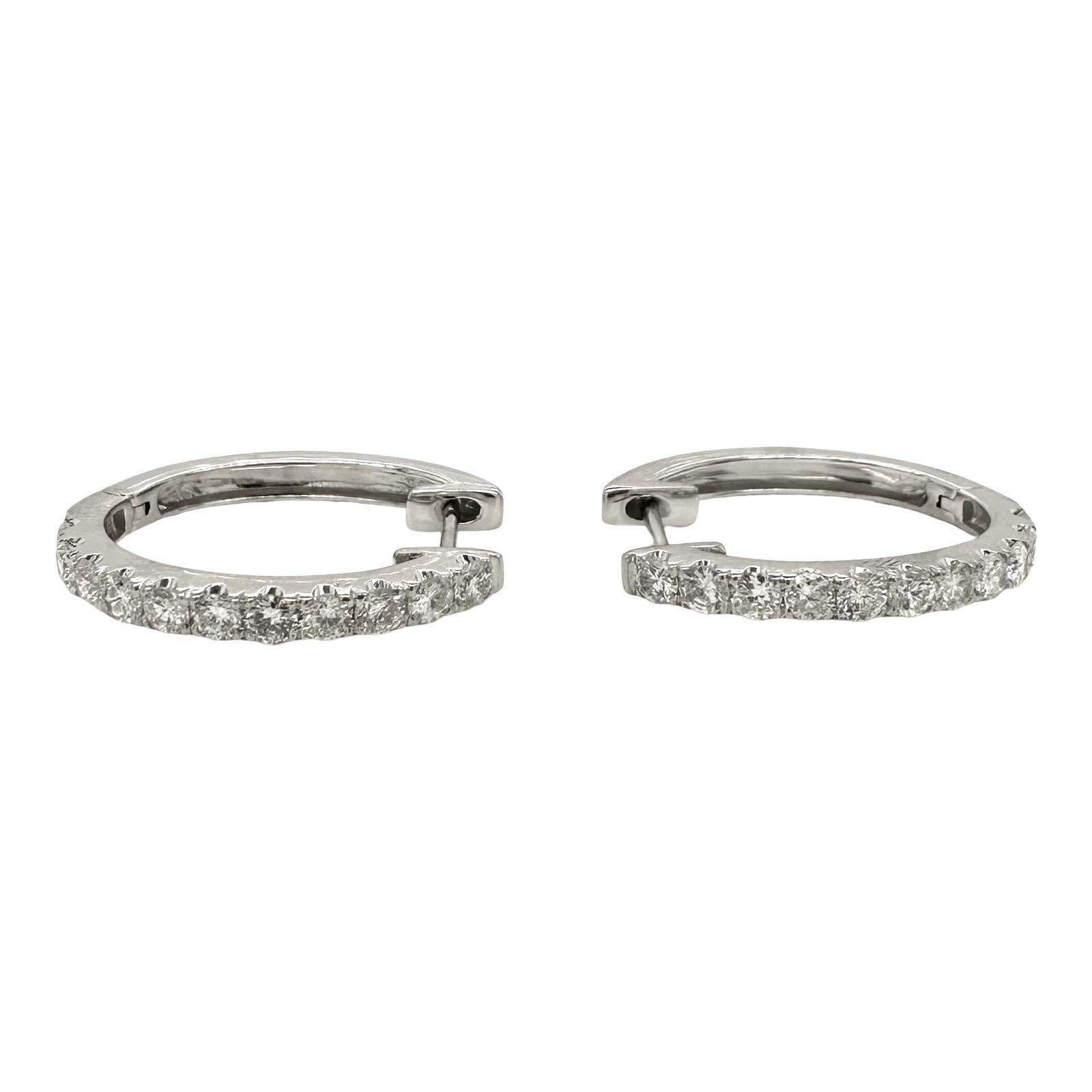 Style: U-Hoop Earrings
Material: 14k White Gold
Stones: Round Diamonds
Total Carat Weight: 0.88 ct
Total Item Weight: 3.7
Dimensions: 0.75 inch (length) x 0.55 inch (width)
