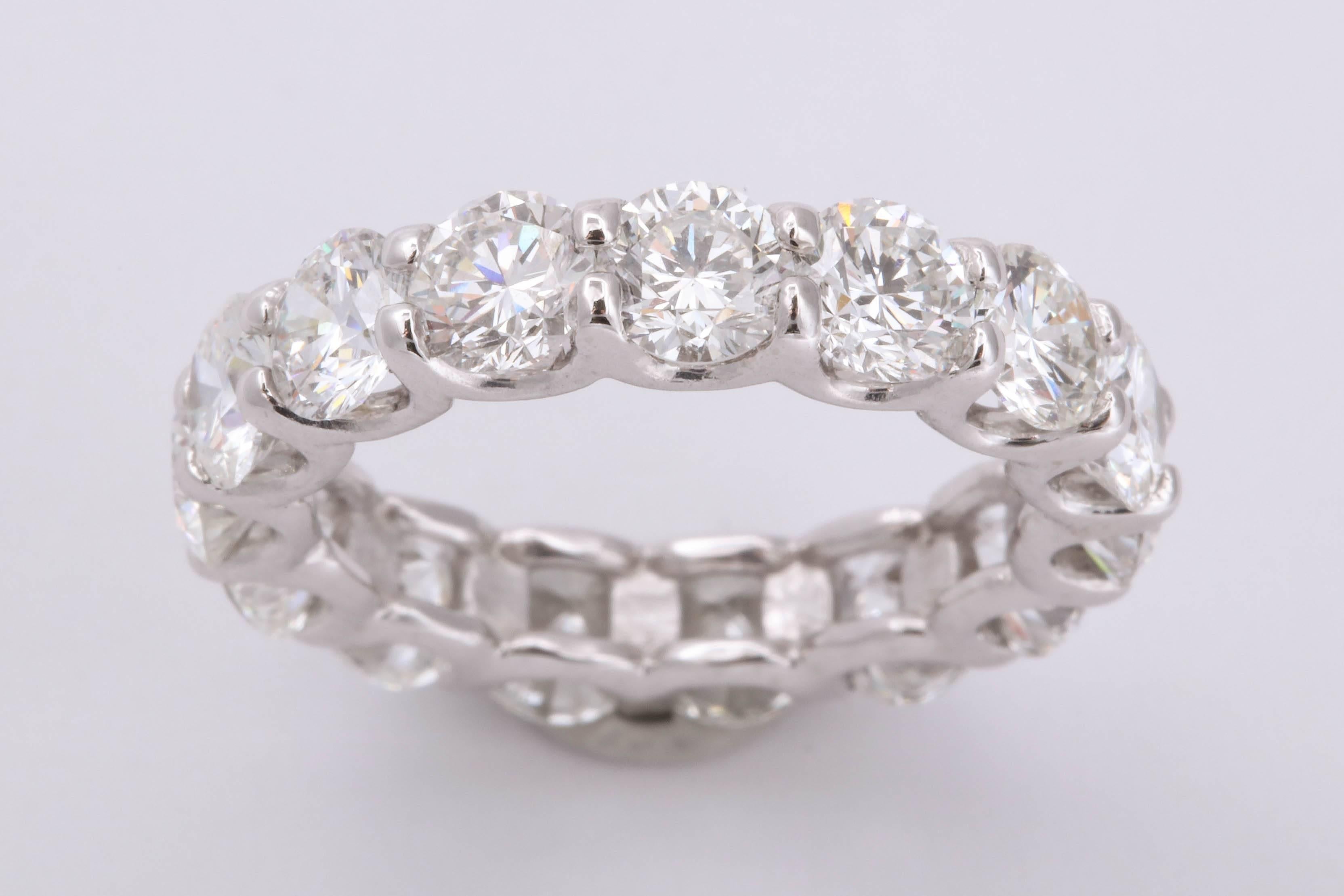 
A beautiful diamond eternity band.

6.40 carats of white round brilliant diamonds set all the way around -- full of fire and brilliance.

platinum 