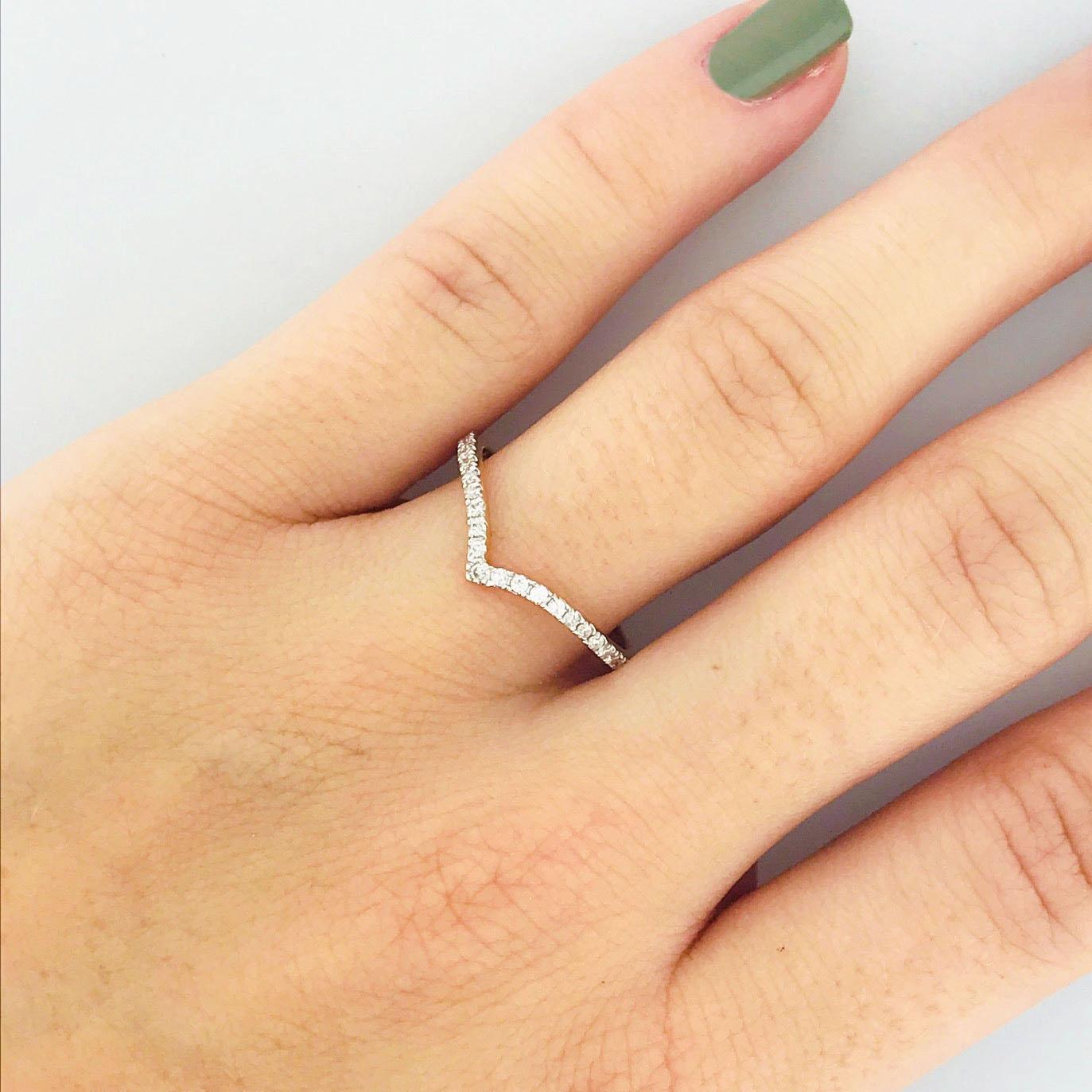 Diamond V Rings are a fabulous stacking band for your engagement ring! This band ring is classy, modern and has a beautiful clean line minimalism. It is a great piece for anyone who loves the dainty look, or likes to customize their jewelry