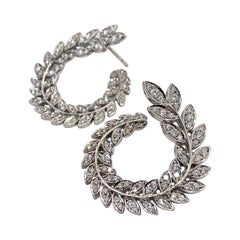 Boucles d'oreilles en forme de vigne en diamants