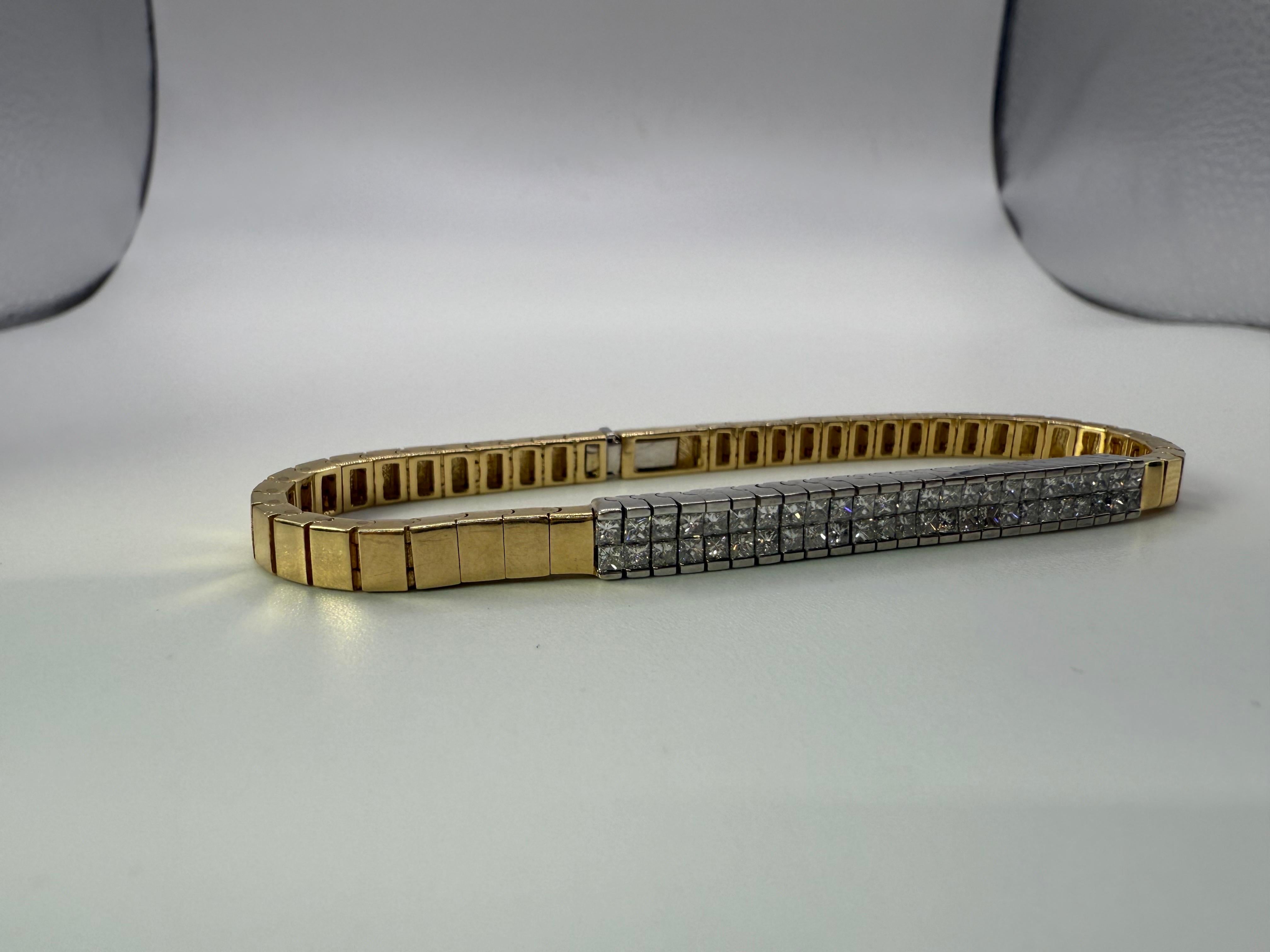 Magnifique bracelet Vintage avec diamants en or blanc et jaune. Livraison gratuite, boîte et certificat. Les diamants sont de pureté Si et de couleur G en moyenne.

CE QUE VOUS OBTENEZ À LA BIJOUTERIE STAMPAR :
Stampar Jewelers, situé au cœur de
