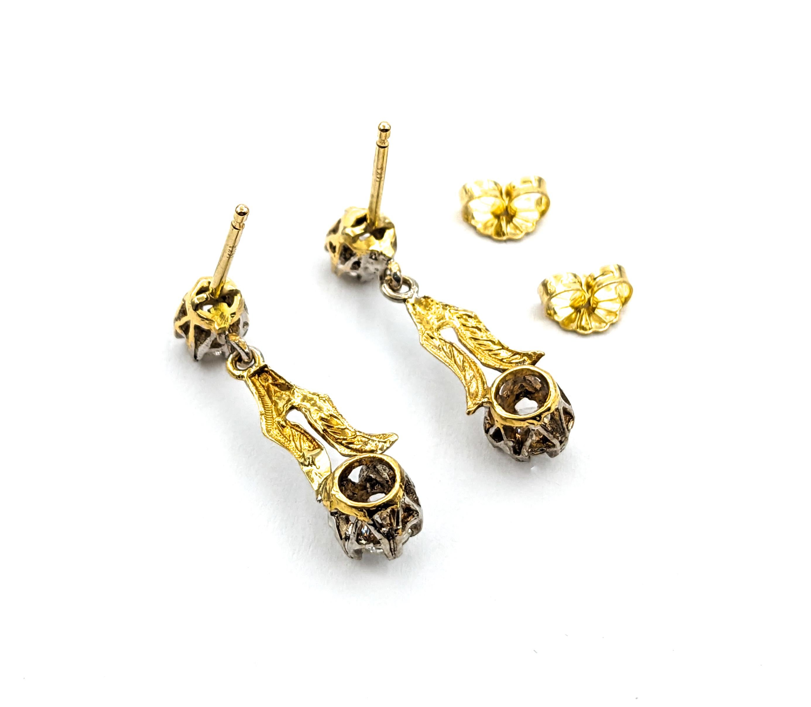 Diamond Vintage Dangle Earrings In Two-Tone Gold



Introducing a pair of stunning Vintage Earrings Dangle, exquisitely crafted in 14kt two-tone gold. These elegant earrings showcase 1.00ctw of diamonds, celebrating the timeless allure of the Mid