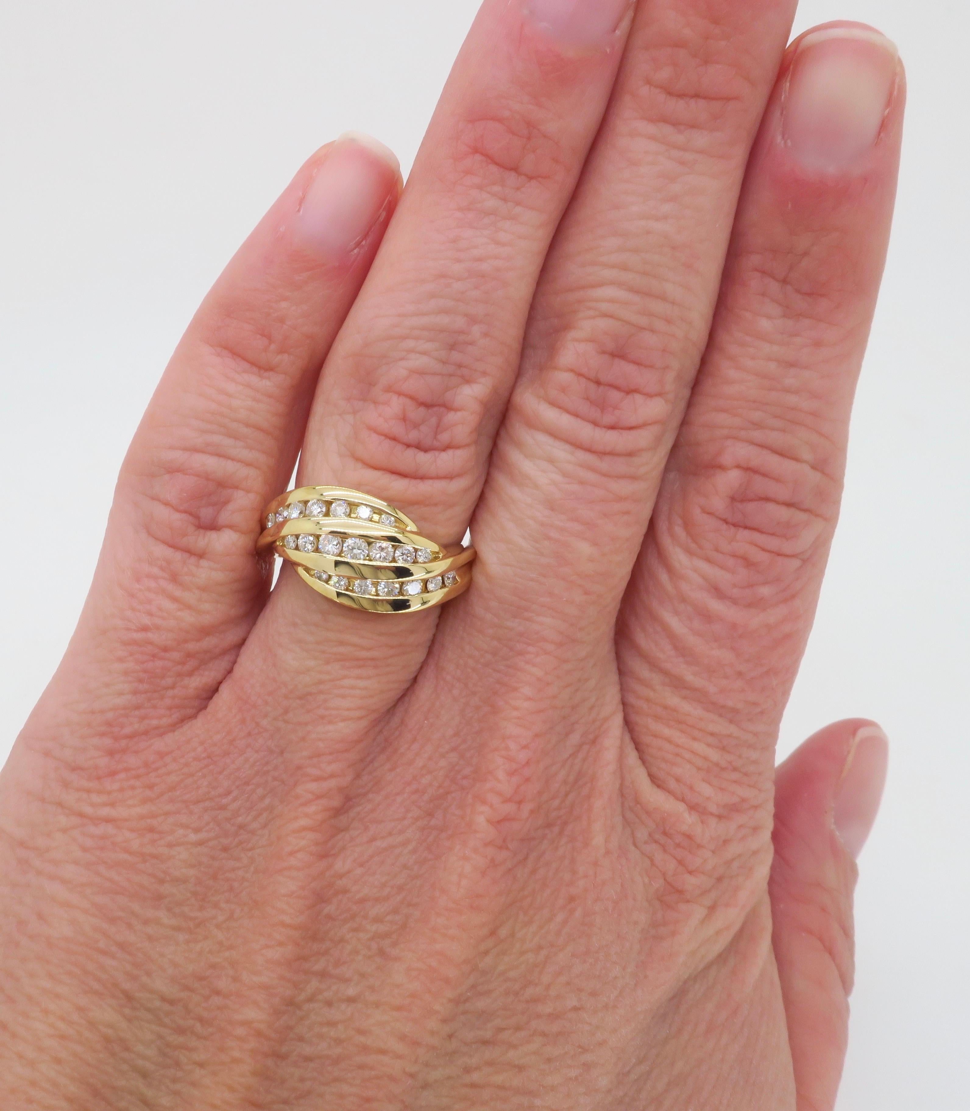 Beautiful cocktail ring made in 14k yellow gold with .70ctw of diamonds. 

Total Diamond Carat Weight: .70CTW
Diamond Shape: Round Brilliant Cut 
Diamond Clarity: VS-SI
Diamond Color: G-H
Metal: 14k Yellow Gold 
Stamped: 