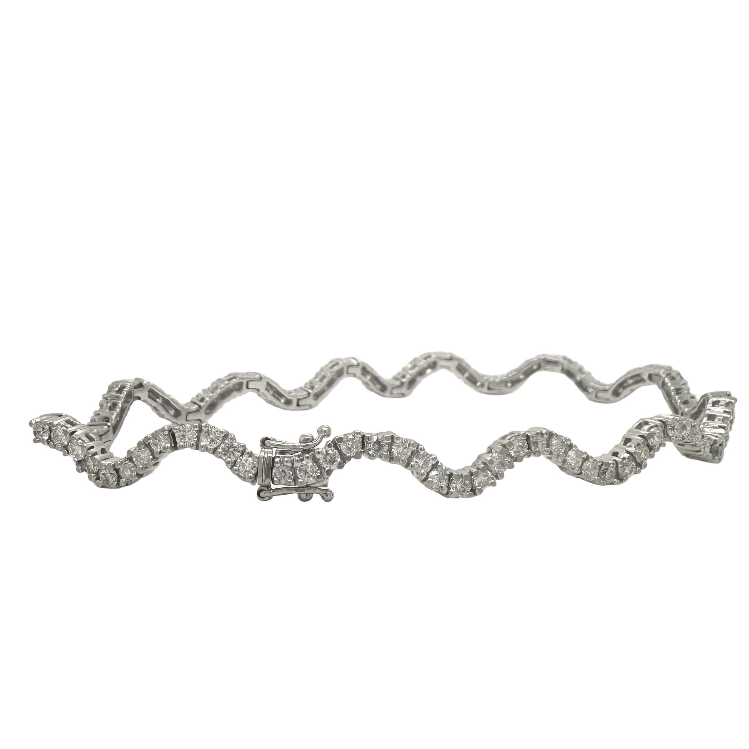 Pulsera de tenis con diamantes ondulados

ESPECIFICACIONES DEL ARTÍCULO:

Estilo Pulsera de tenis ondulada
Metal: Oro blanco
Pureza del metal: 14k
Piedras: 90 diamantes redondos
Color del diamante: H
Claridad del diamante: VS
Peso total en quilates: