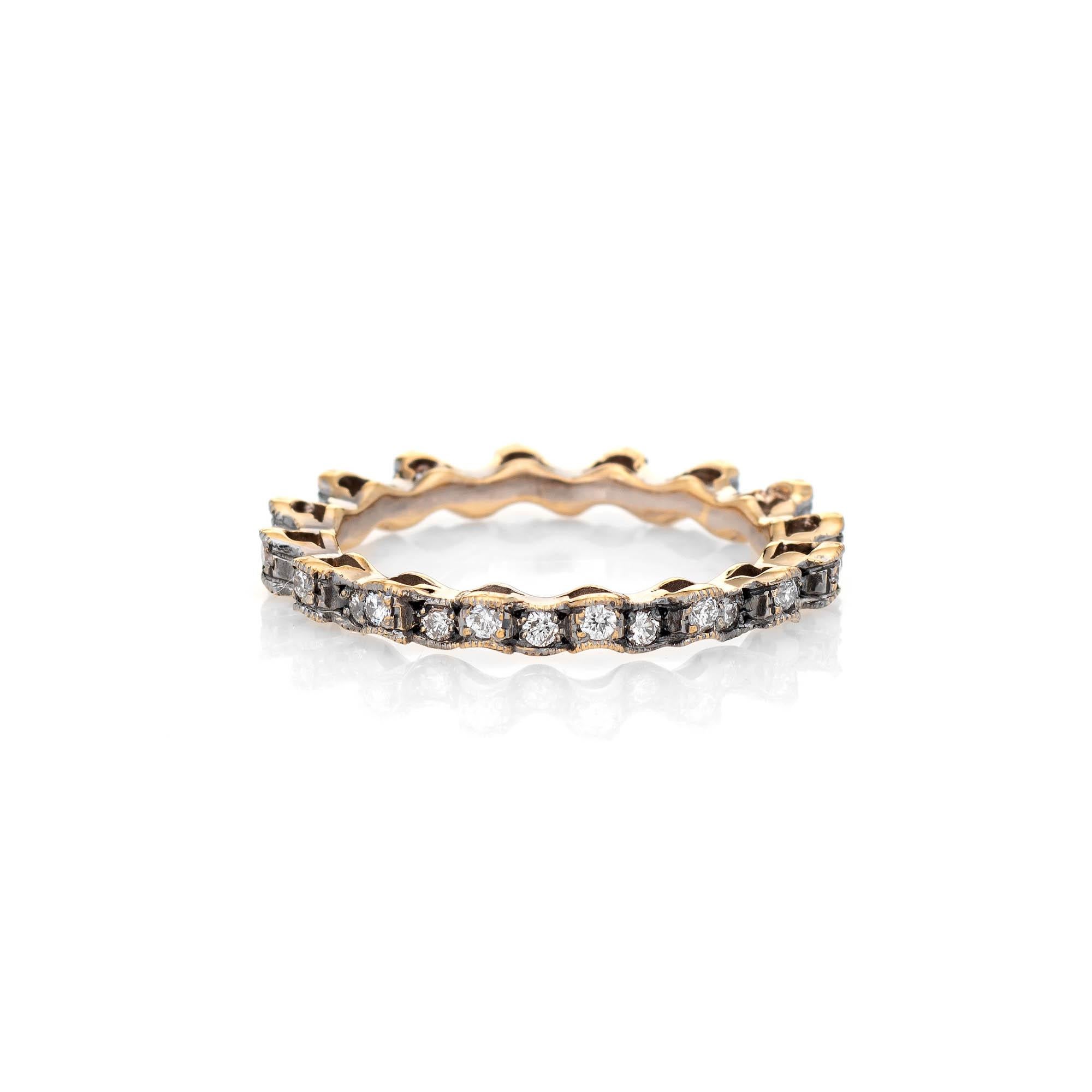 Stylish estate diamond eternity ring crafted in 18 karat yellow gold. 

Diamonds total an estimated 0.35 carats (estimated at I-J color and SI2-I1 clarity). 

The unique ring features a wavy undulating design with diamonds set around the entire