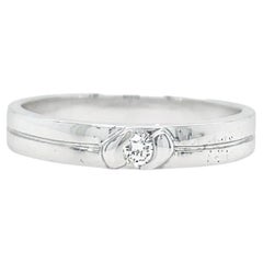 Fede nuziale con diamante in oro bianco 18k