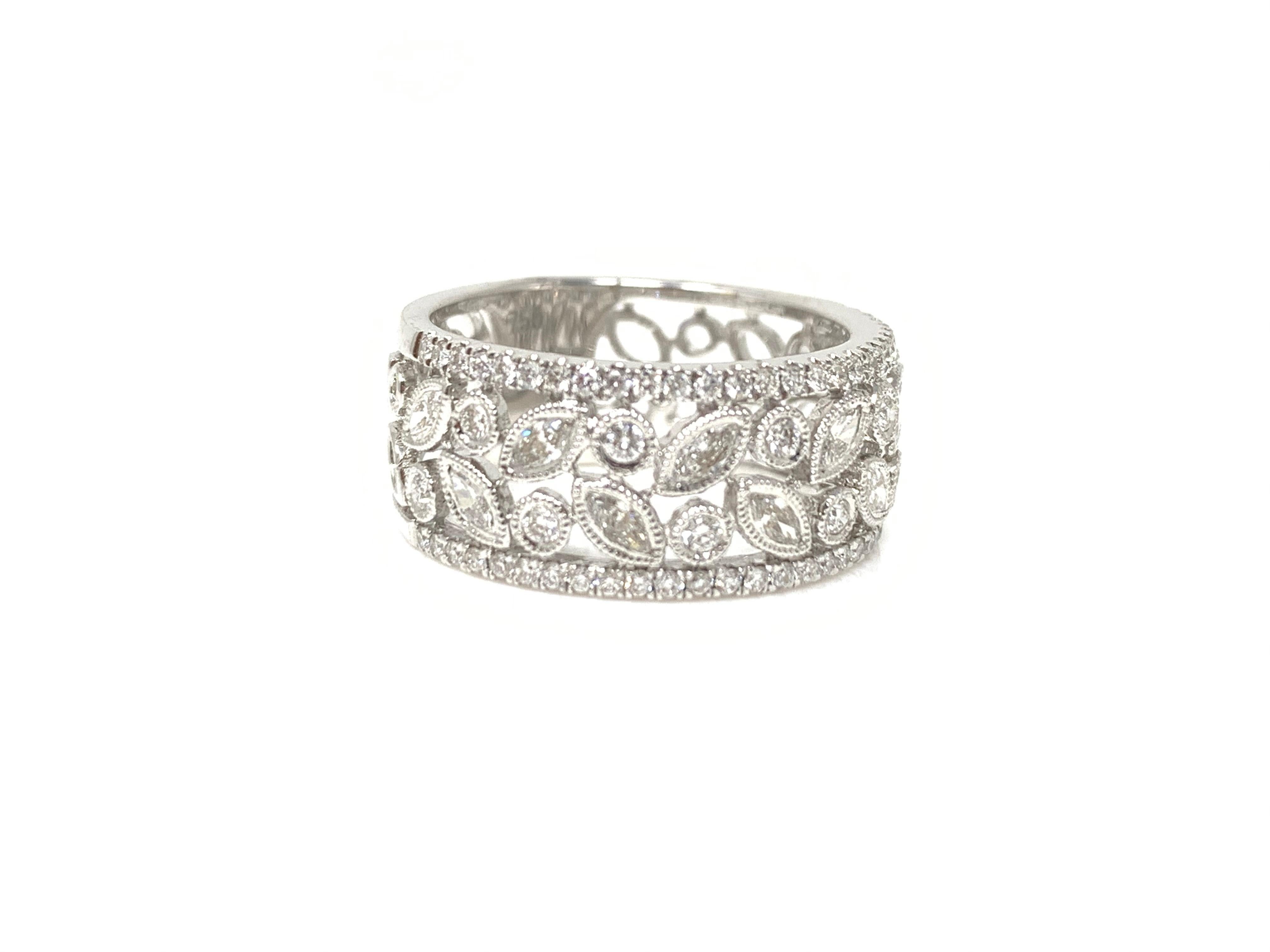 Moguldiam Inc diamond wedding band set in 18k white gold. 
The details are as follows: 
Diamond weight: 0.93
metal : 18k white gold 
Ring size : 6 1/2 