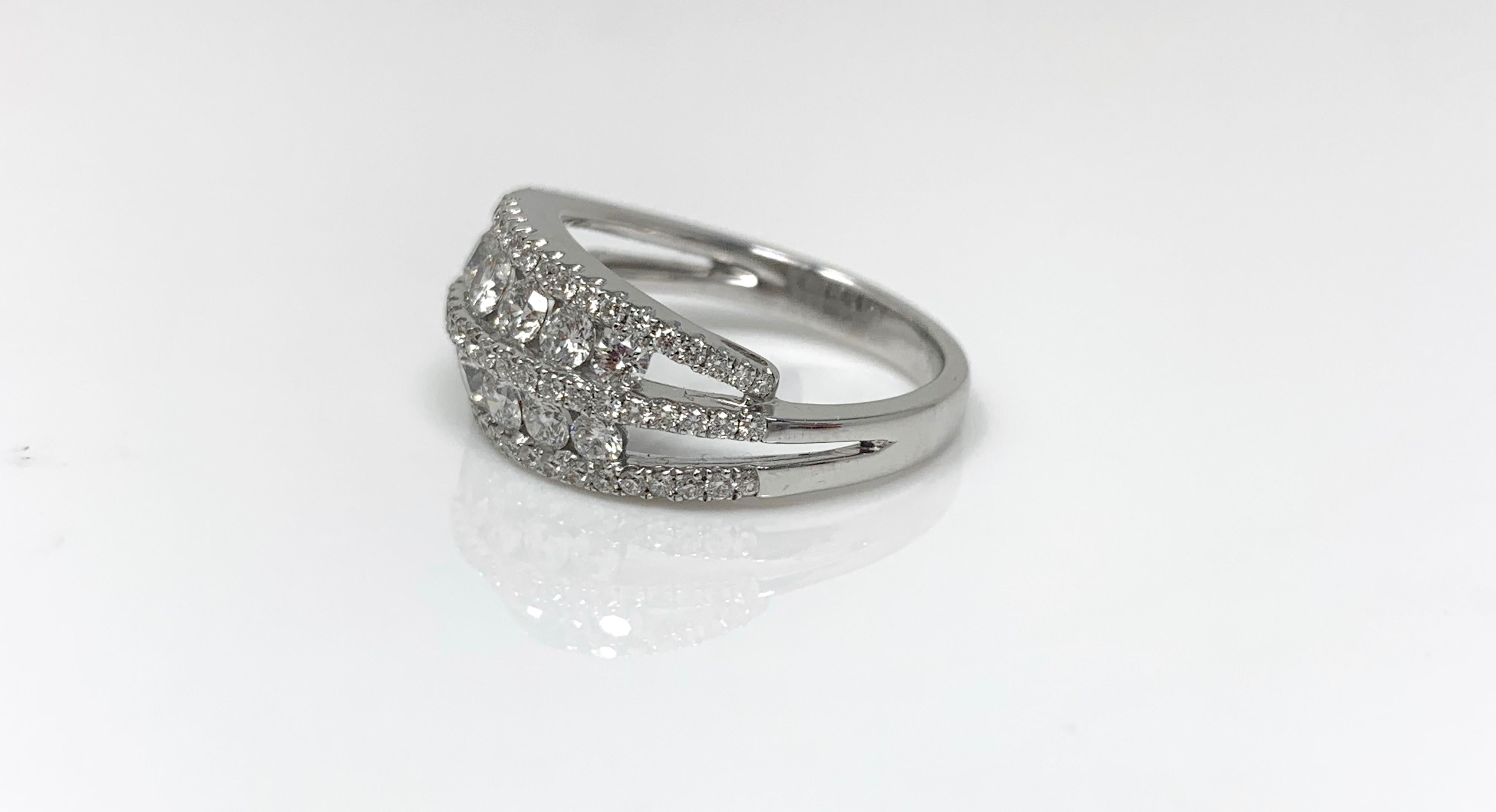 Moguldiam Inc Diamond Wedding Band In 18K White Gold. 
Diamond weight : 1.53 carat 
metal : 18 k white gold 
ring size : 6 1/2 