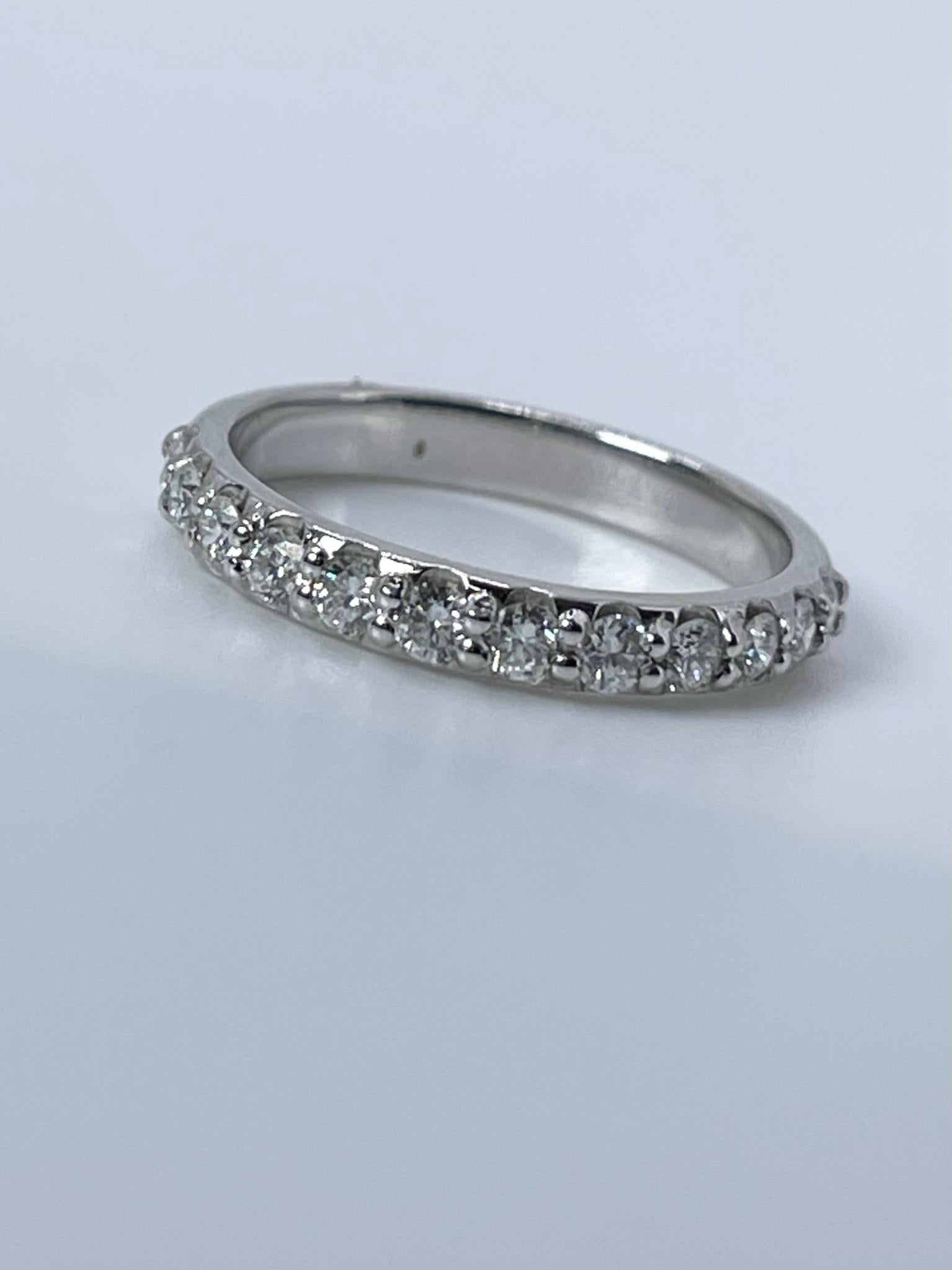 Half way set wedding band with natural diamonds in platinum.
ITEM#: IFI 110-00004
GRAM WEIGHT: 2.90gr
METAL: PLATINUM

NATURAL DIAMOND(S)
Cut: Round Brilliant
Color: F-G
Clarity: VS-SI 
Carat: 0.58ct
Size: 7.5 ( can be re-sized)


WHAT YOU GET AT