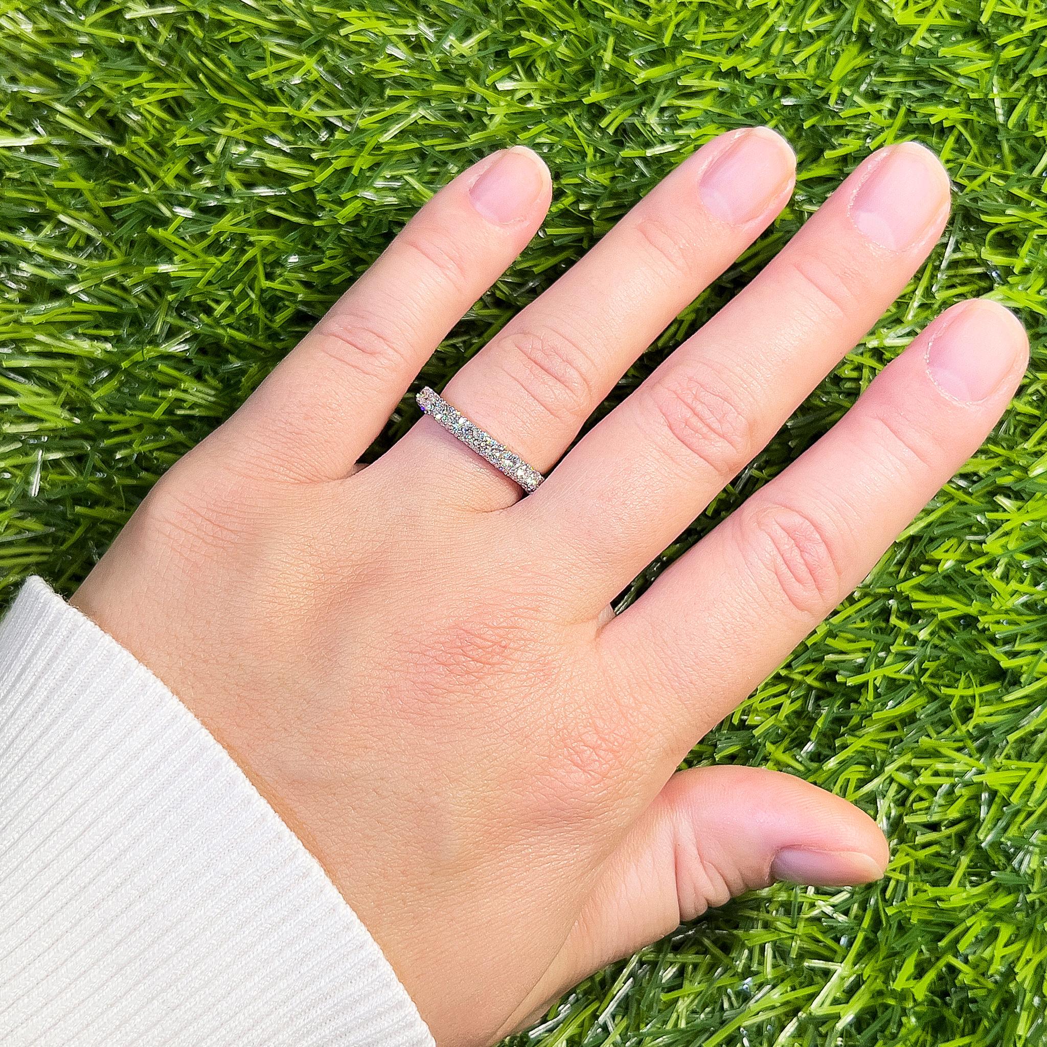 It comes with the appraisal by GIA GG/AJP
Diamonds = 1.41 Carats
Total Quantity: 47
Origin: Natural, Cut: Round
Metal: 18K White Gold
Ring Size: 7 US