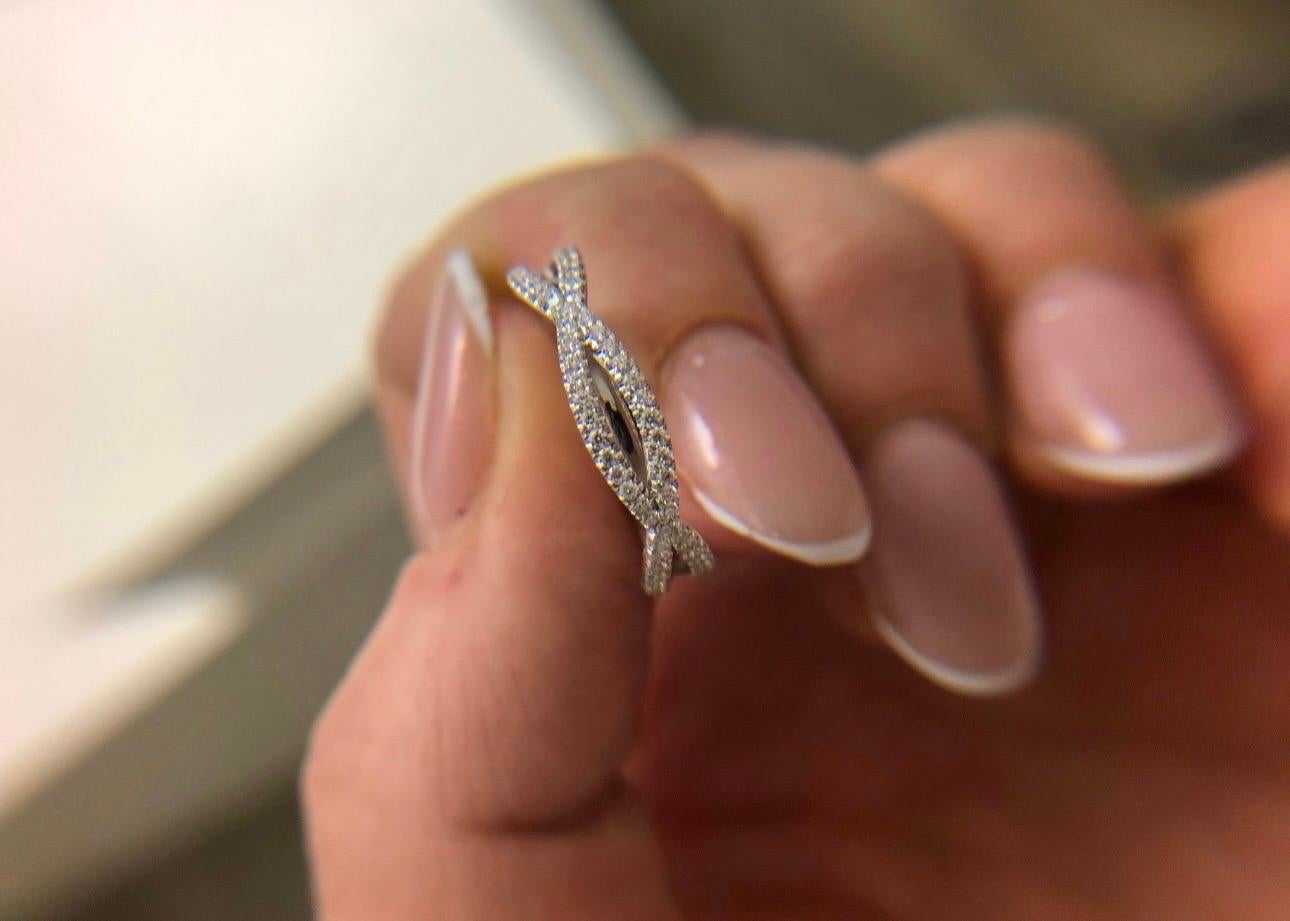 Fine diamond ring made with VS clarity diamonds, E-F color in 18KT white gold, twisted design, very modern and comfortable when on hand!

Certificate comes with the purchase!
ABOUT US
We are a family-owned business. Our studio in located in the