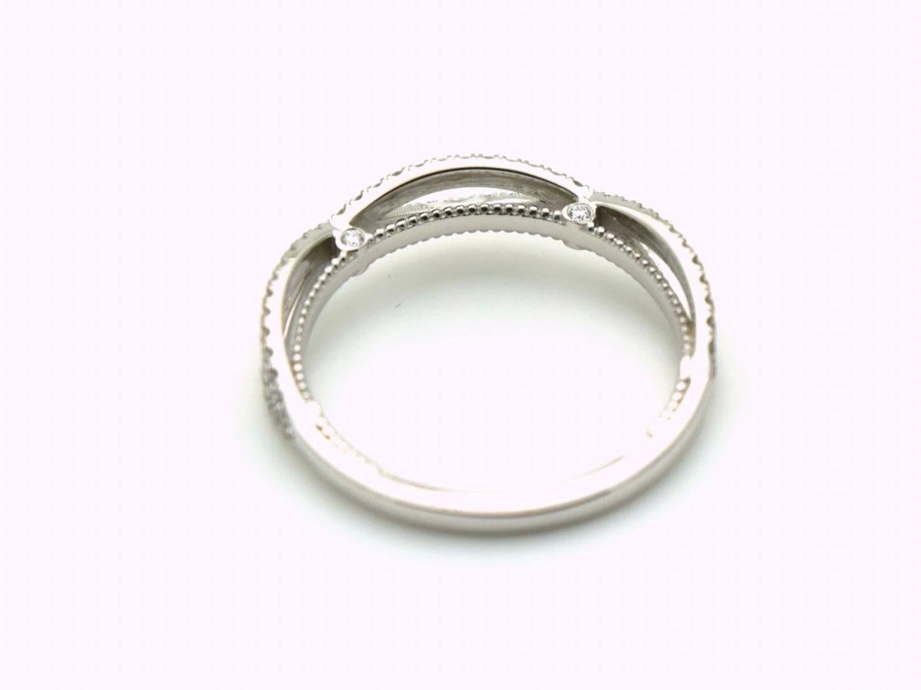 Diamond Wedding Band Twist 18KT white gold Fine Diamonds VS 0.55ct In New Condition For Sale In Boca Raton, FL