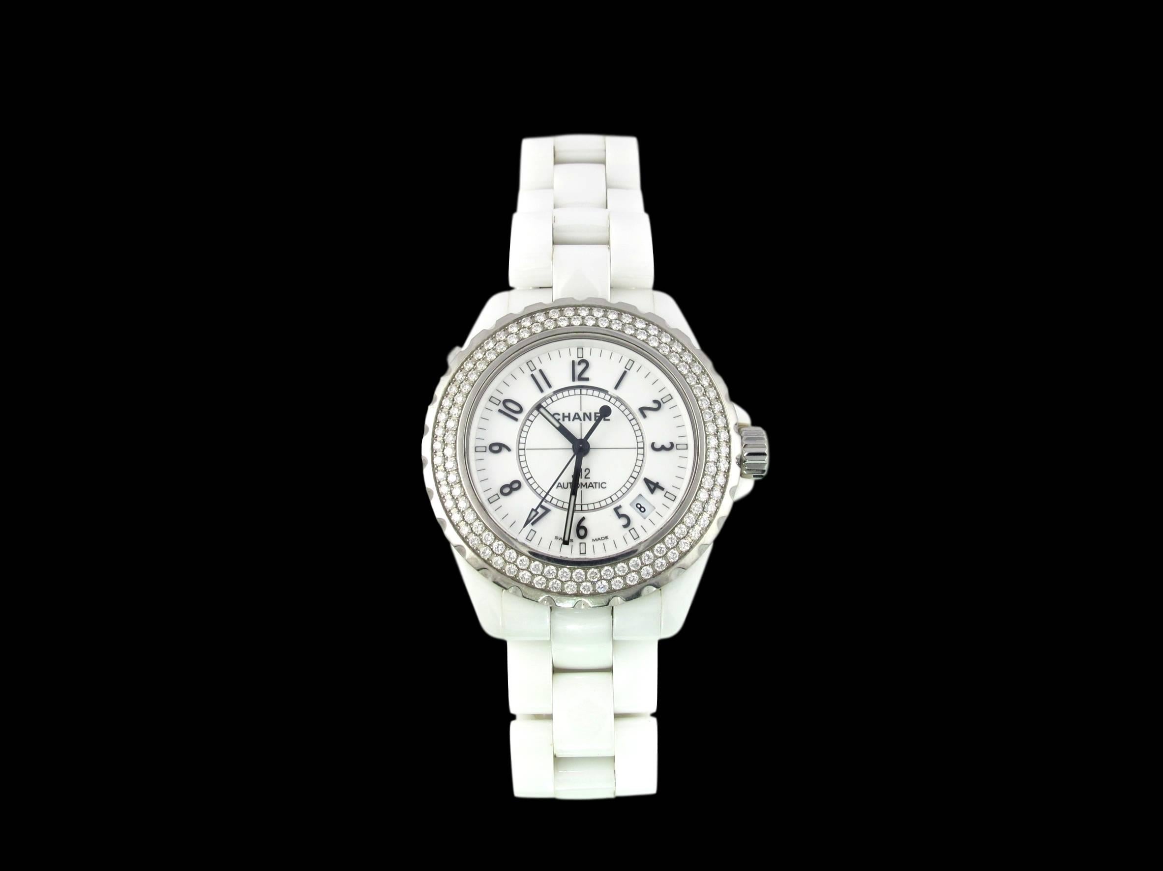 Created by CHANEL in 2000, the J12 represents a turning point in contemporary watchmaking. This ceramic watch asserts an allure that transcends fashion trends and genres. 
Round white dial set with a 120 diamonds on bezel within a high-tech 38mm
