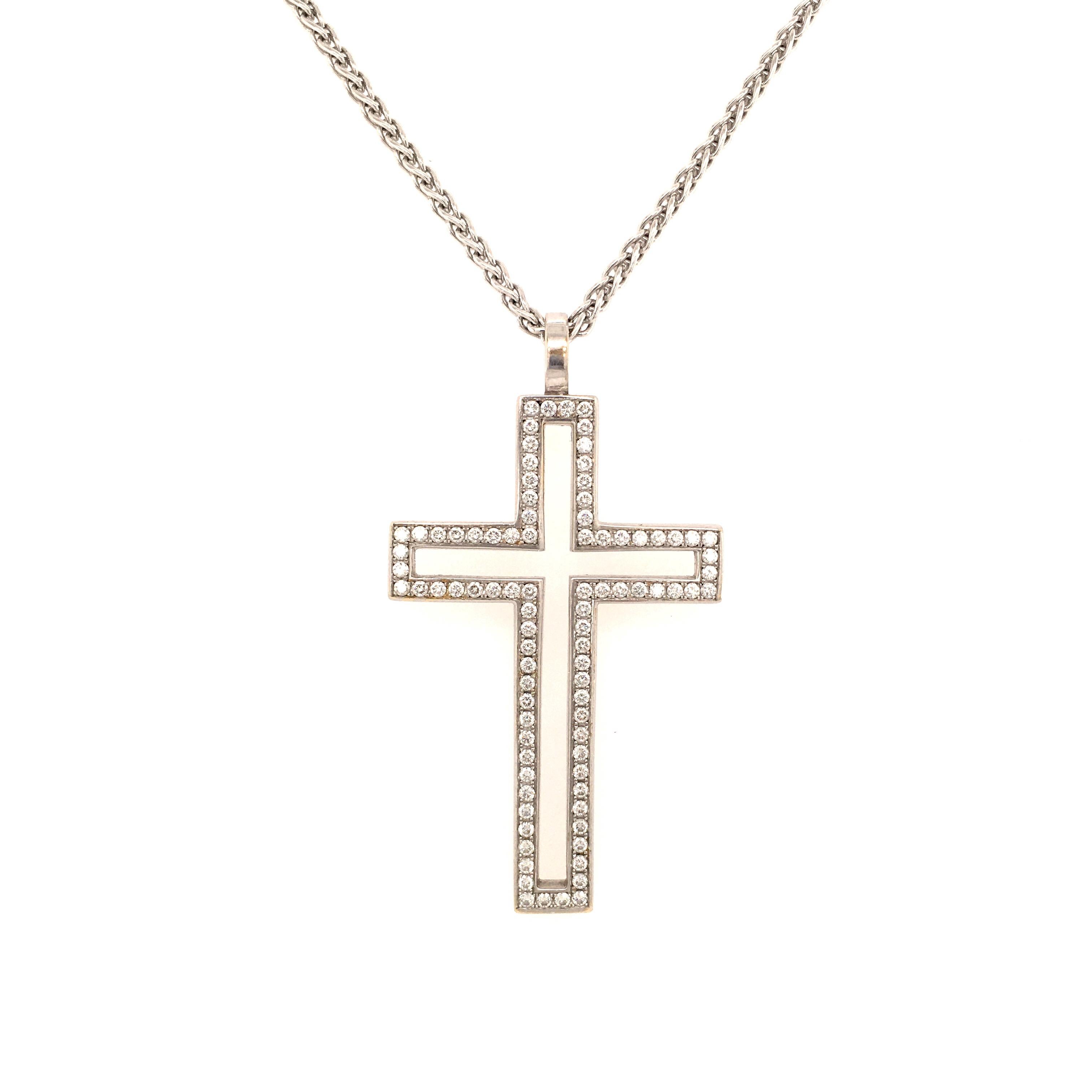 Gorgeous white gold 750 cross pendant carefully set with 88 brilliant cut diamonds totaling approx. 1.20 ct of G/H-si quality.

Dimensions: 5.0 x 3.2 cm / 1.96 x 1.26 inches
Maker's mark: present
Assay mark: 750

Price without chain. We carry many