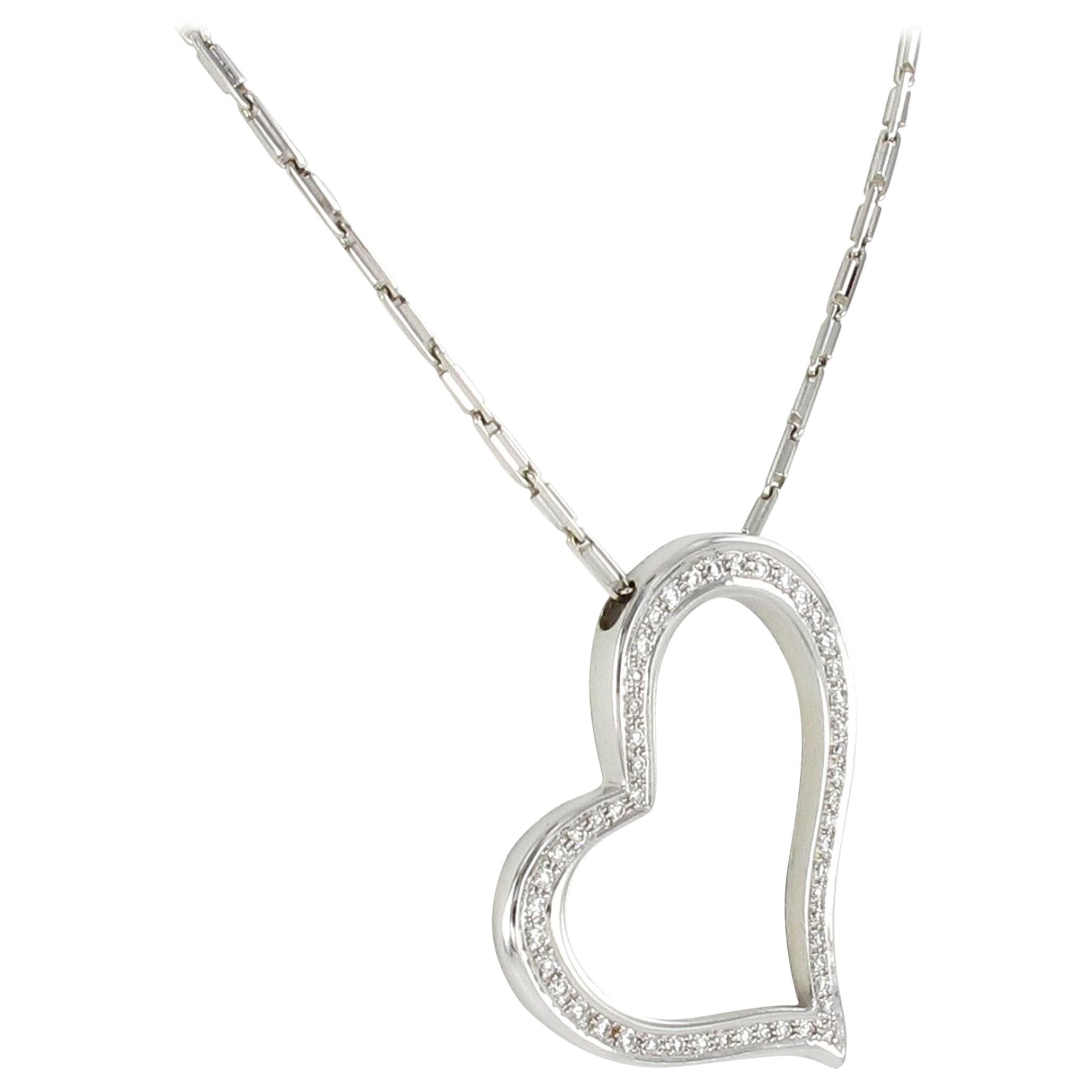 Pendentif cœur en or blanc 750 avec chaîne et diamants en vente