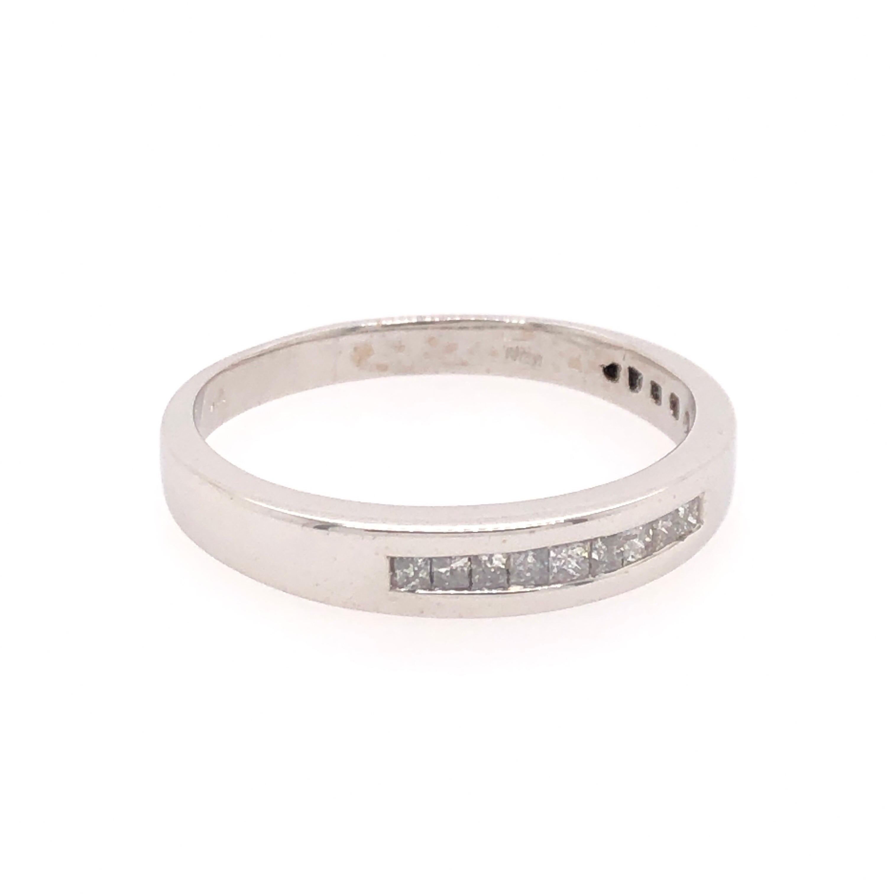 Clean with a touch of bling, this tapered 14K white gold men’s wedding band is perfect if you want an accent of diamonds without the fuss. Nine square diamonds with an estimated total of 0.16 CTS sit neatly in a row along the 14K white gold band.