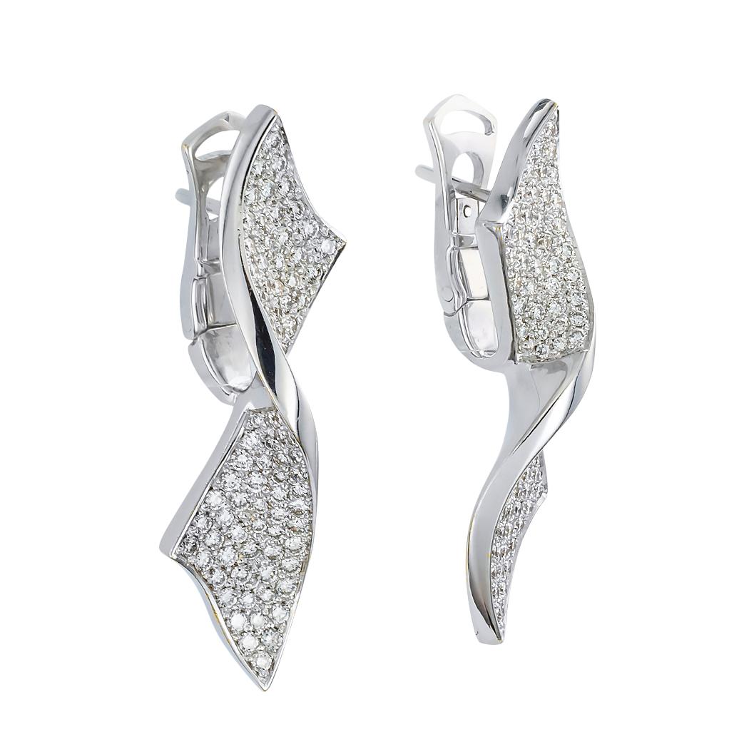 Diamond and white gold bow-shaped earrings by Casa Gi circa 2000.

We are here to connect you with beautiful and affordable estate and vintage jewelry.

Clear and concise information is listed below for your information.  Contact us right away if